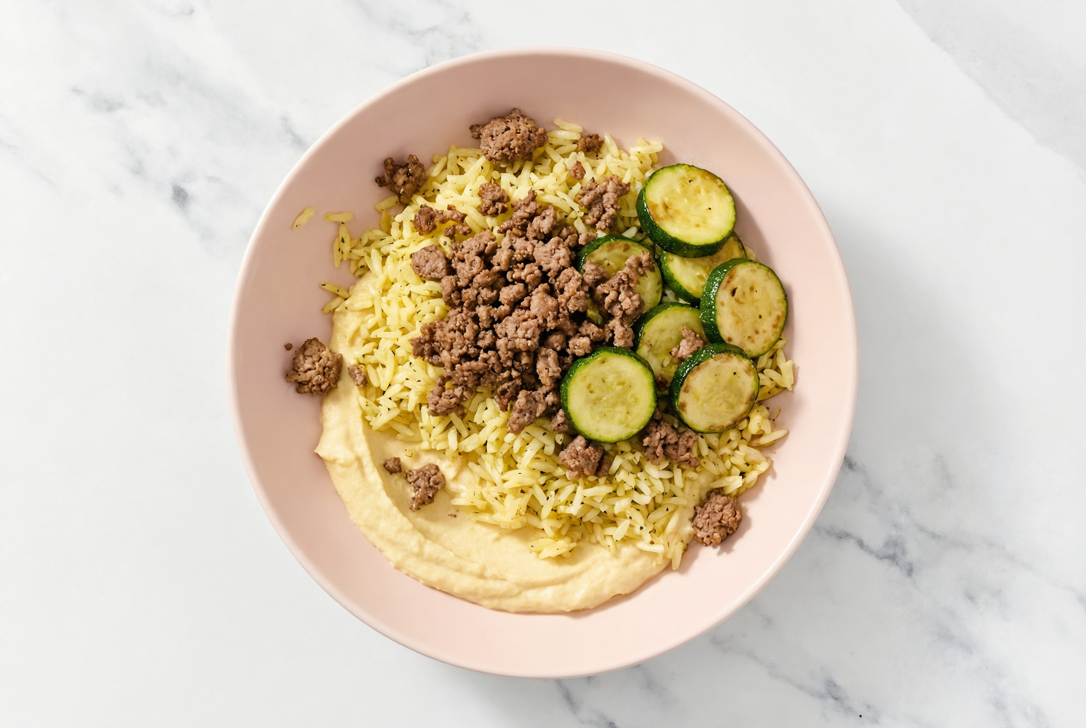 Ground Lamb & Zucchini Grain Bowl with Lemon Garlic Hummus