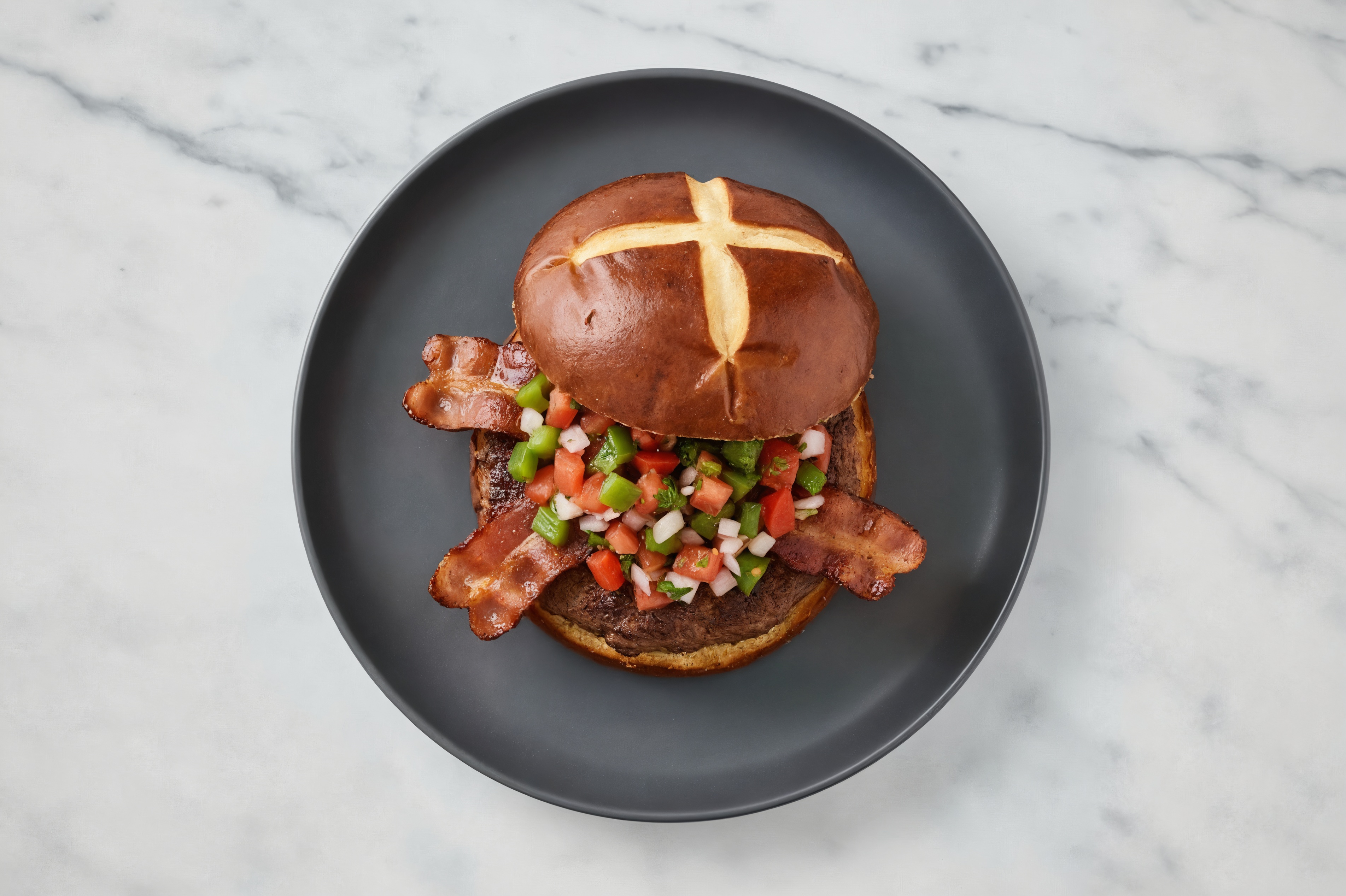 Bison Burger on Pretzel with Salsa & Turkey Bacon