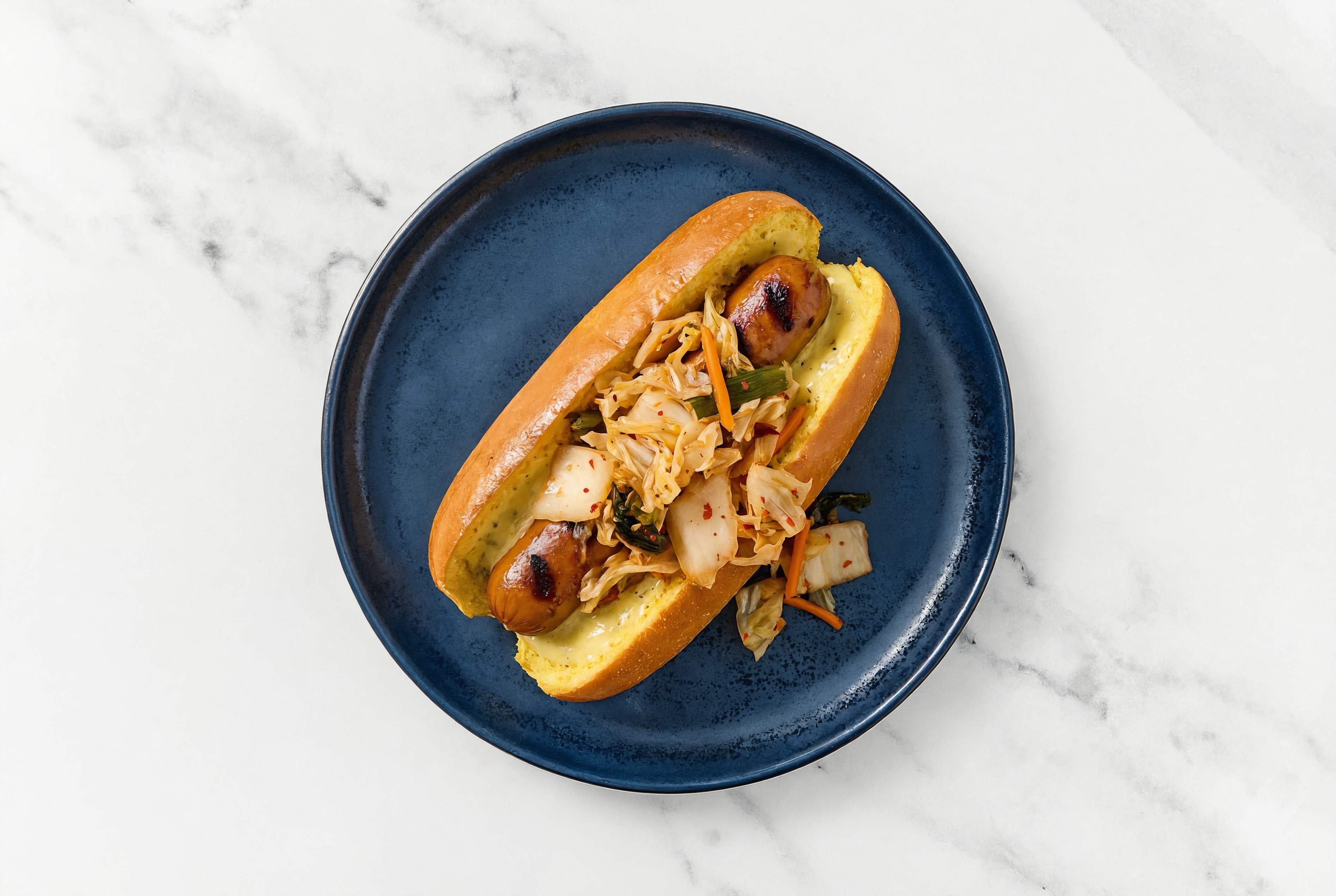 Kimchi Smart Dog with Honey Musard Garlic Sauce on Brioche