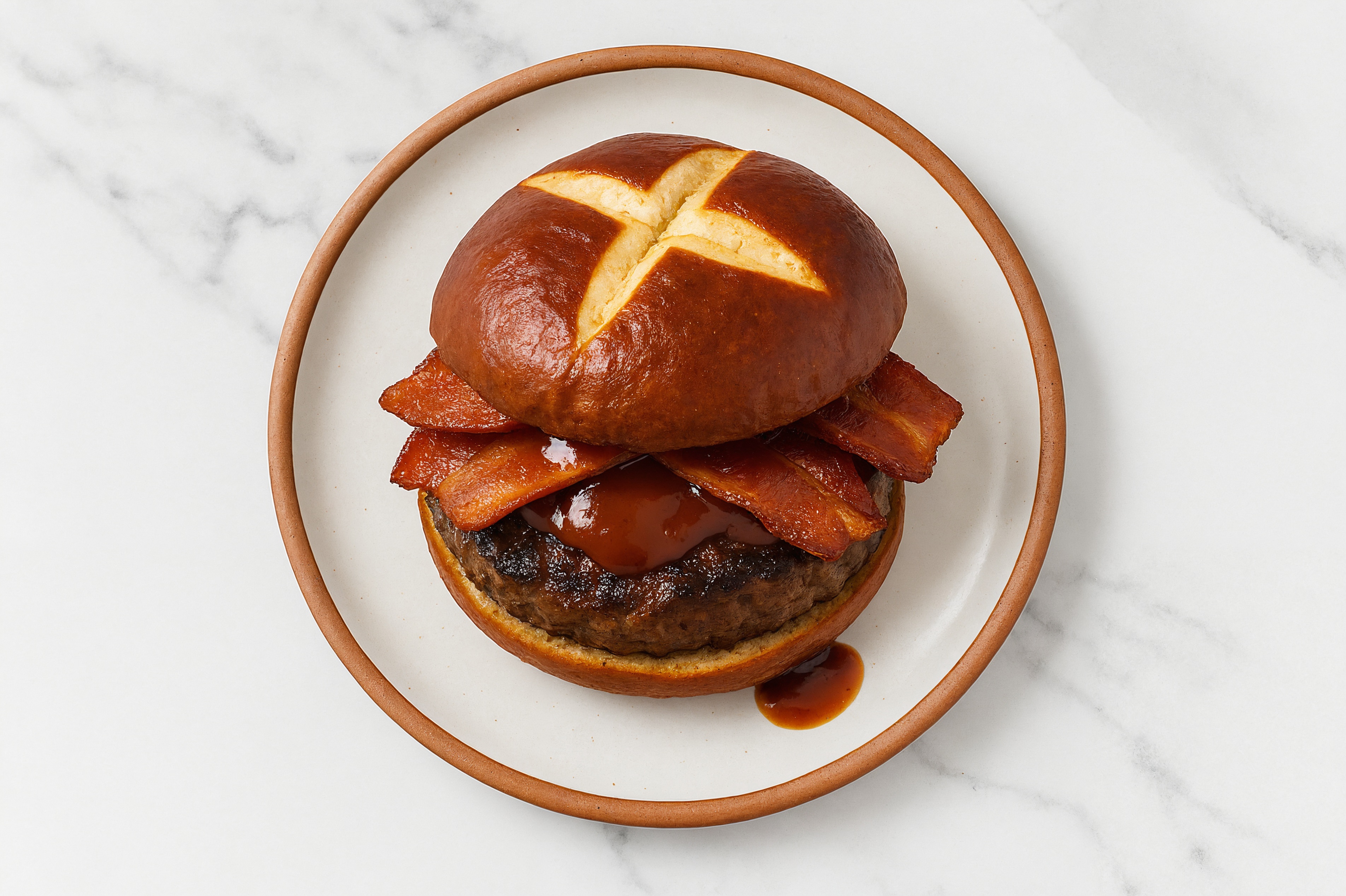 Beef Burger on Pretzel with BBQ & Turkey Bacon with Original BBQ