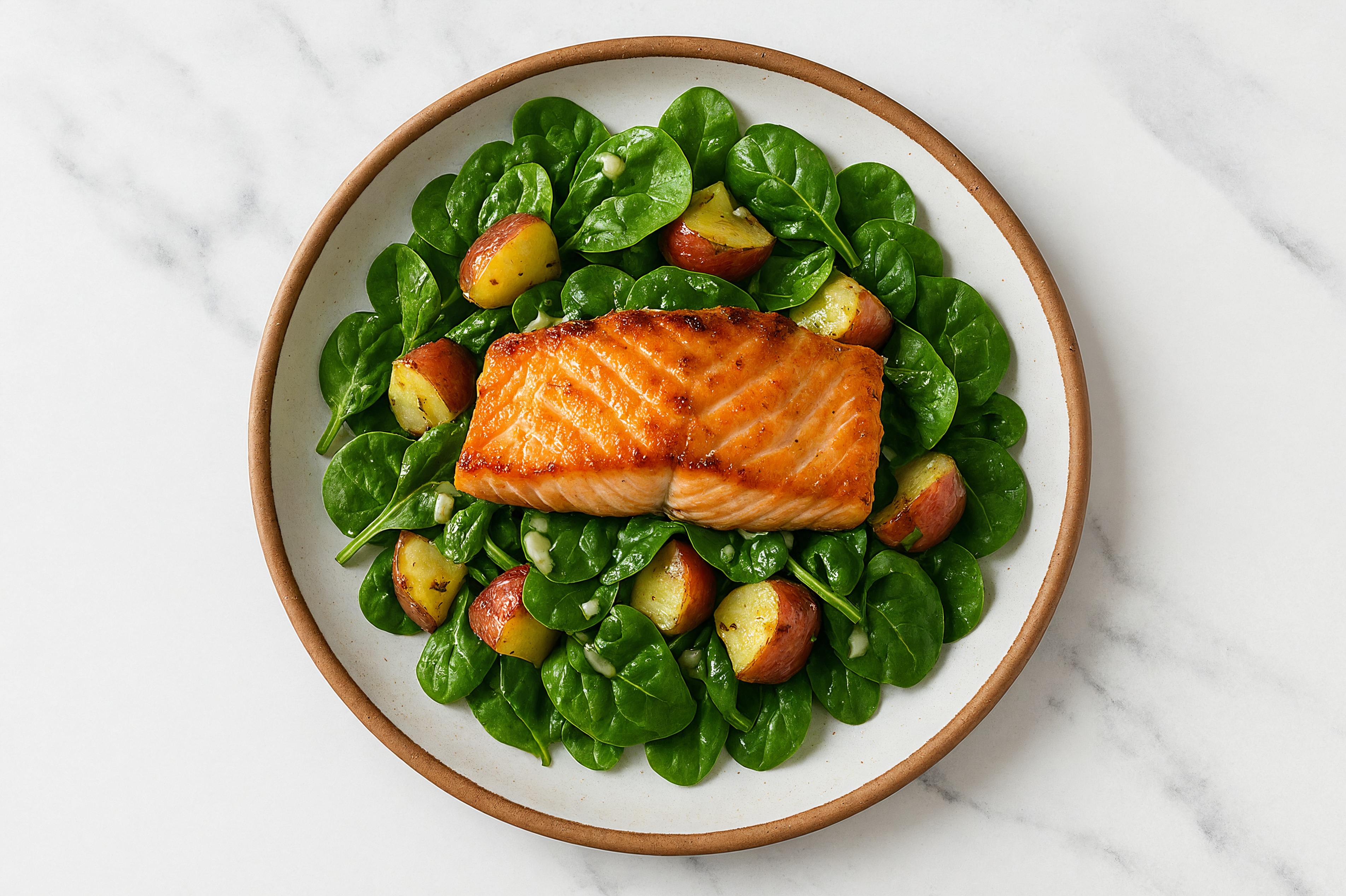 Hearty Seared Salmon Caesar Salad with Baby Spinach