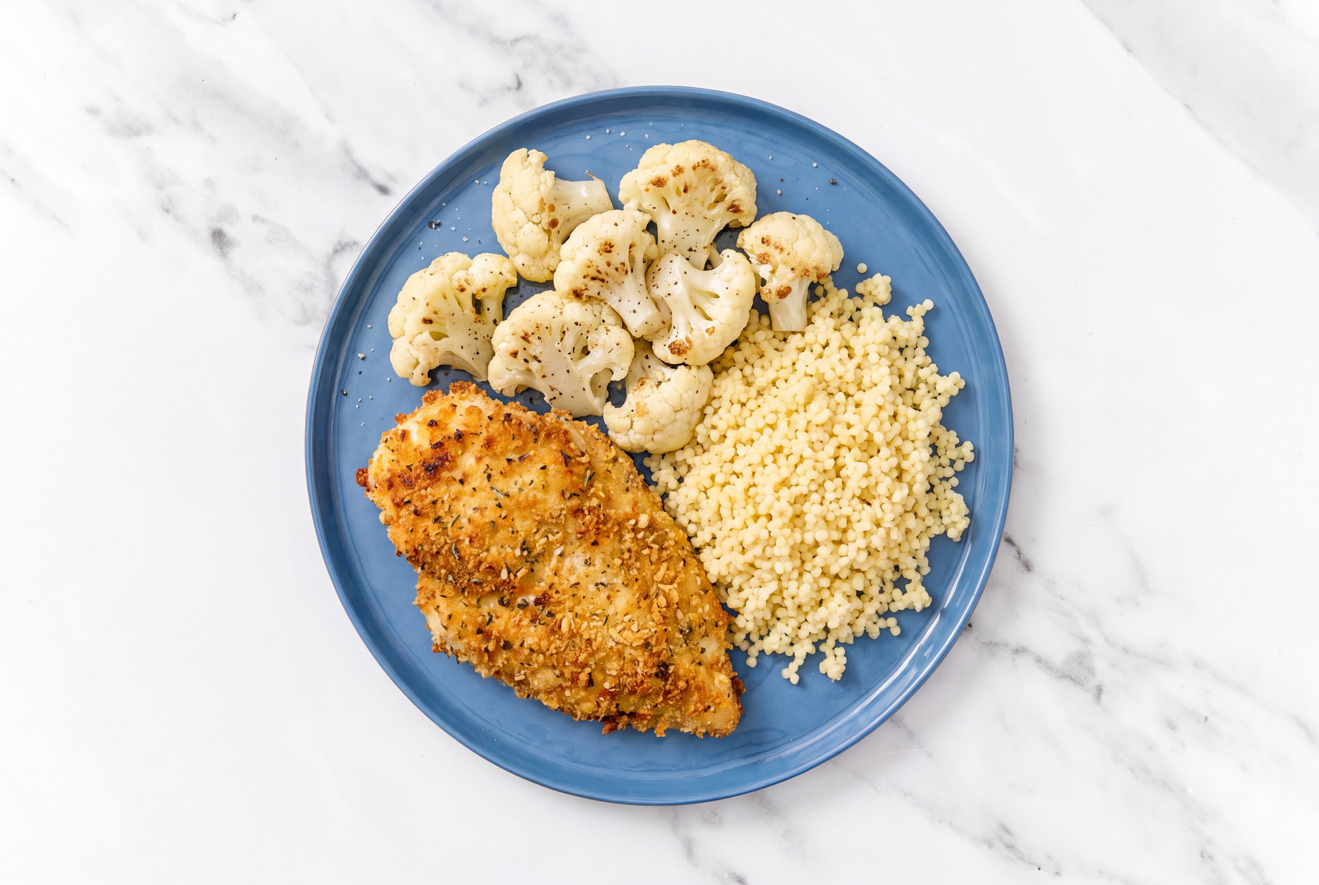Parmesan Breaded Chicken Cutlet with Cauliflower Florets & Couscous