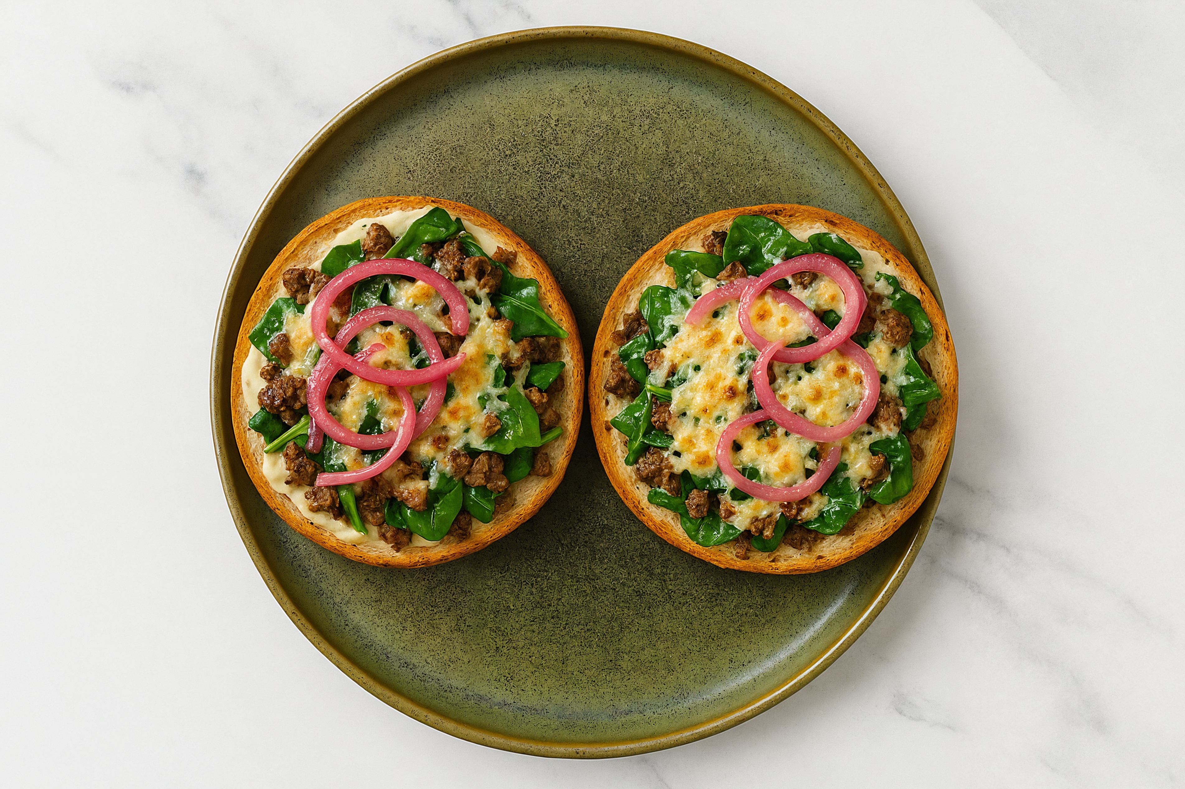 Truffle Ground Beef + Spinach Pizza Gluten-Free Plain Bagels with Pickled Onion