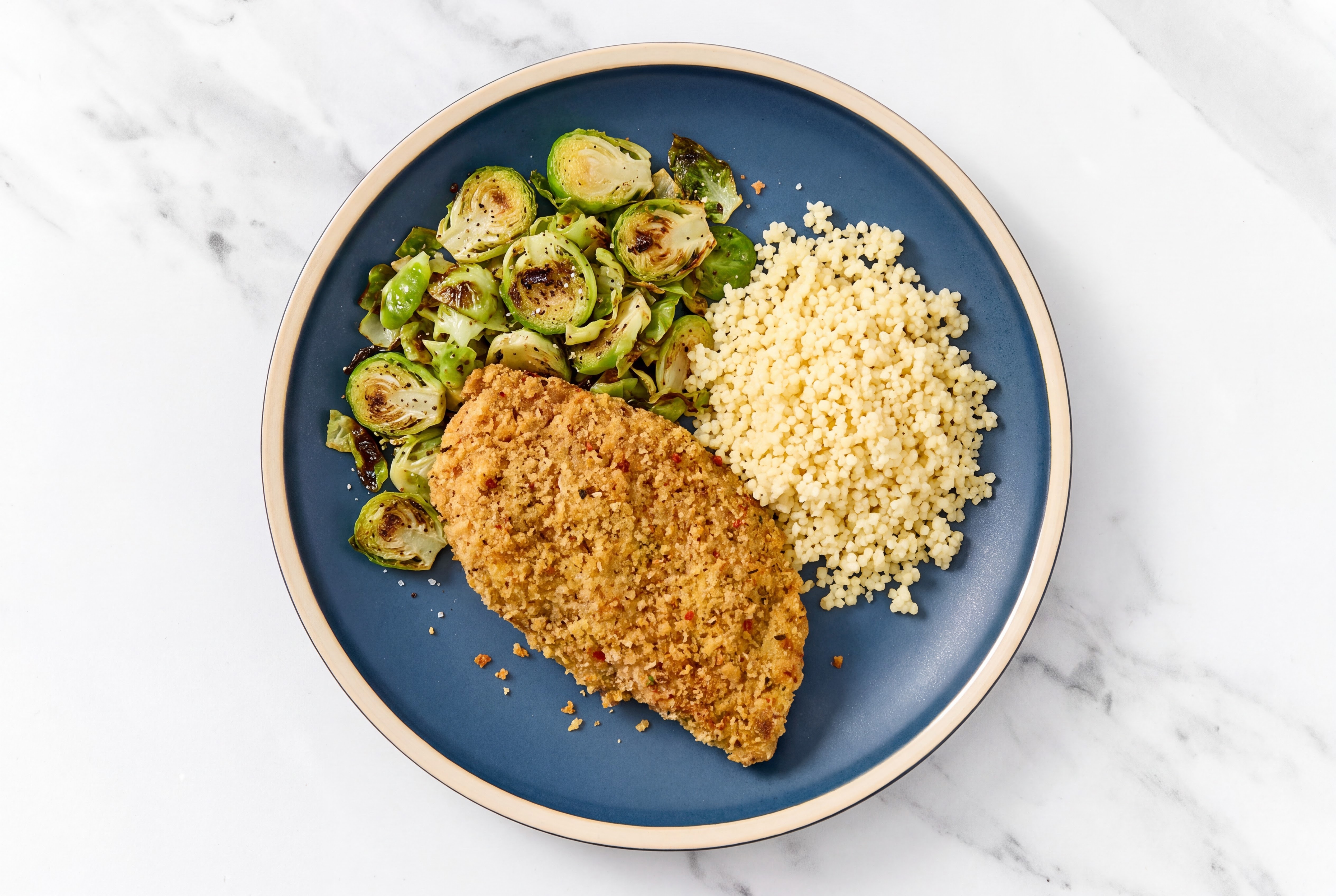 Parmesan Breaded Chicken Cutlet with Brussels Sprouts & Couscous
