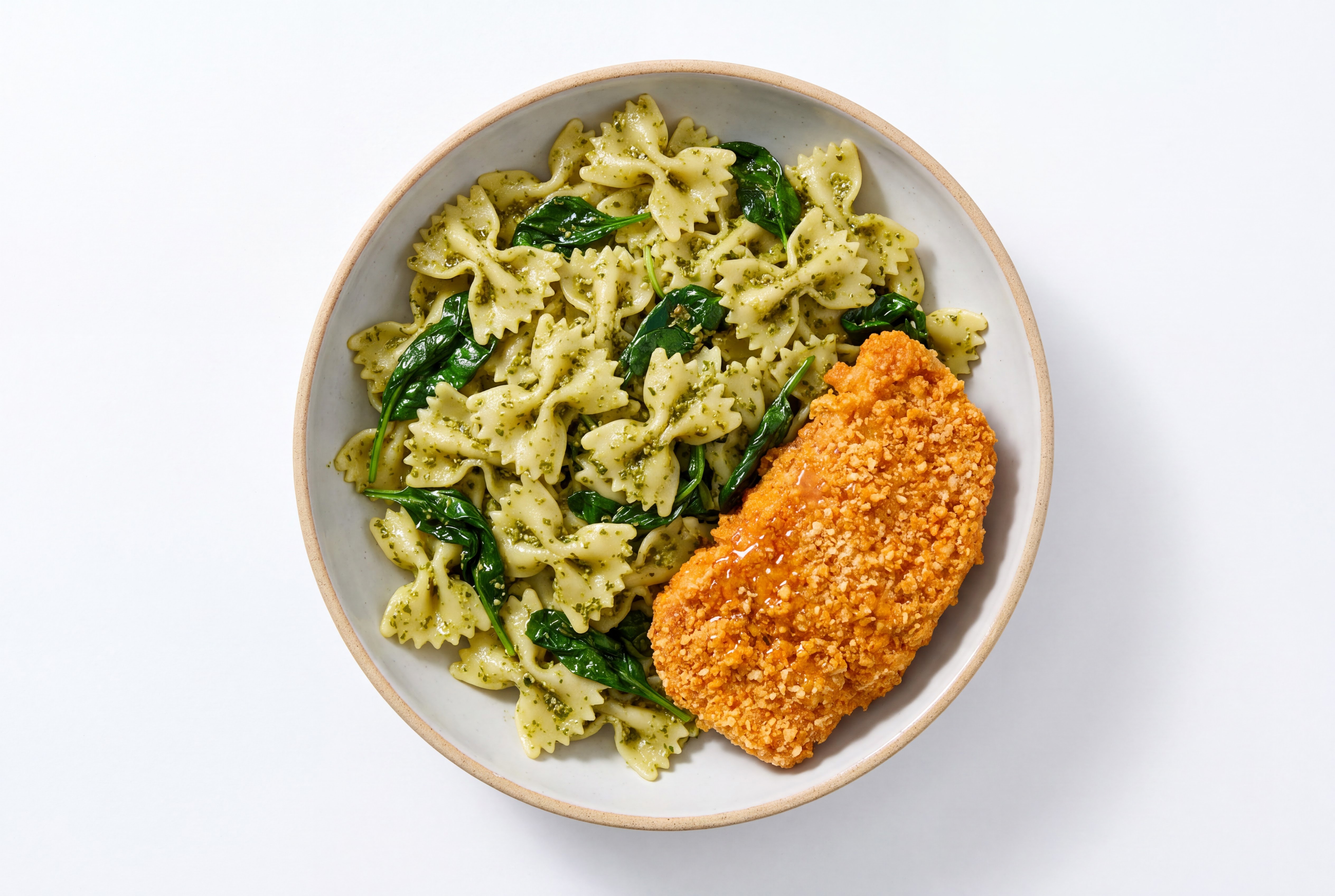 Crispy Hot Honey Chicken over Pesto Farfalle with Baby Spinach