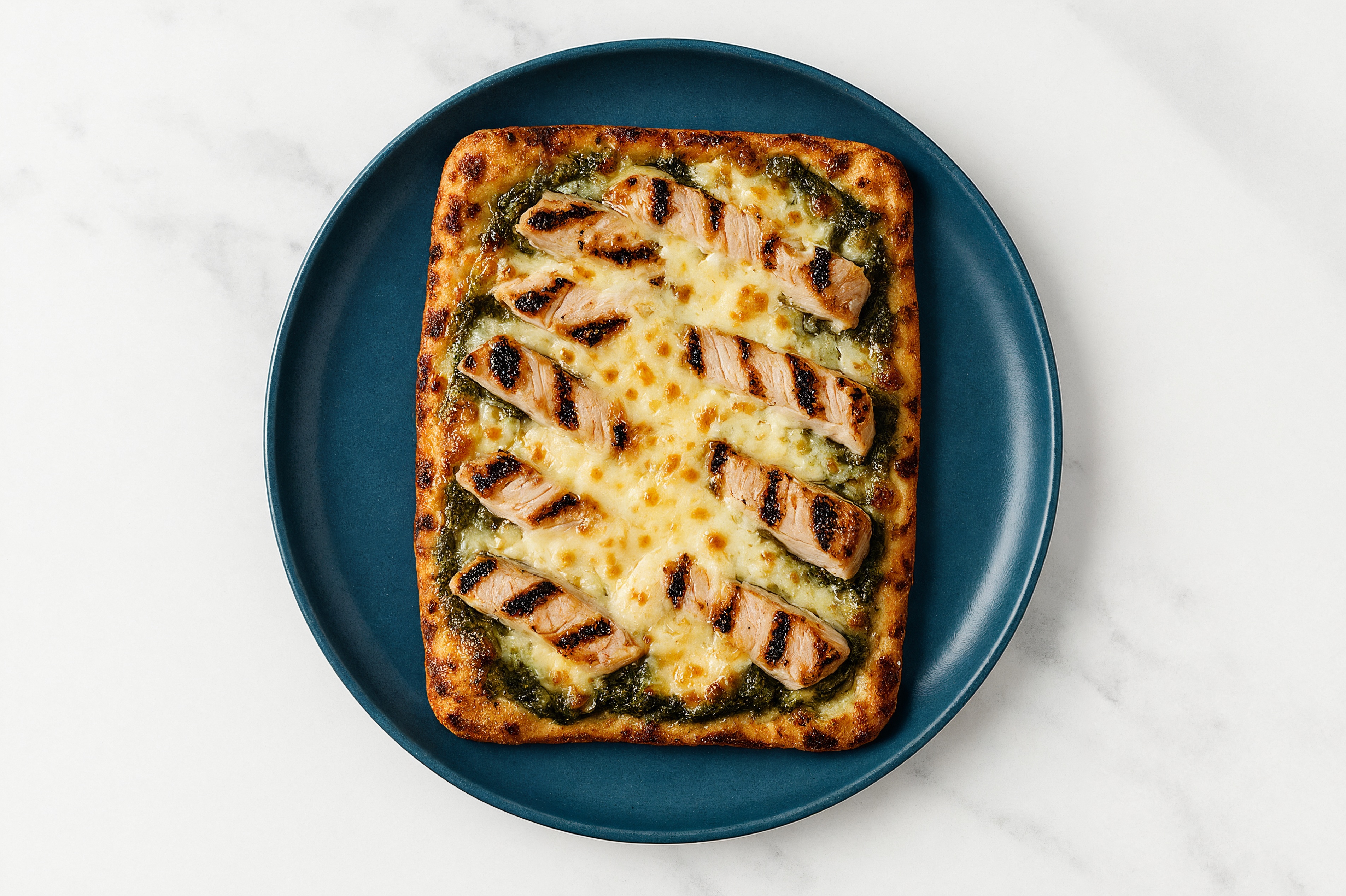 Pesto Pork Pizza with Shredded Mozzarella Cheese