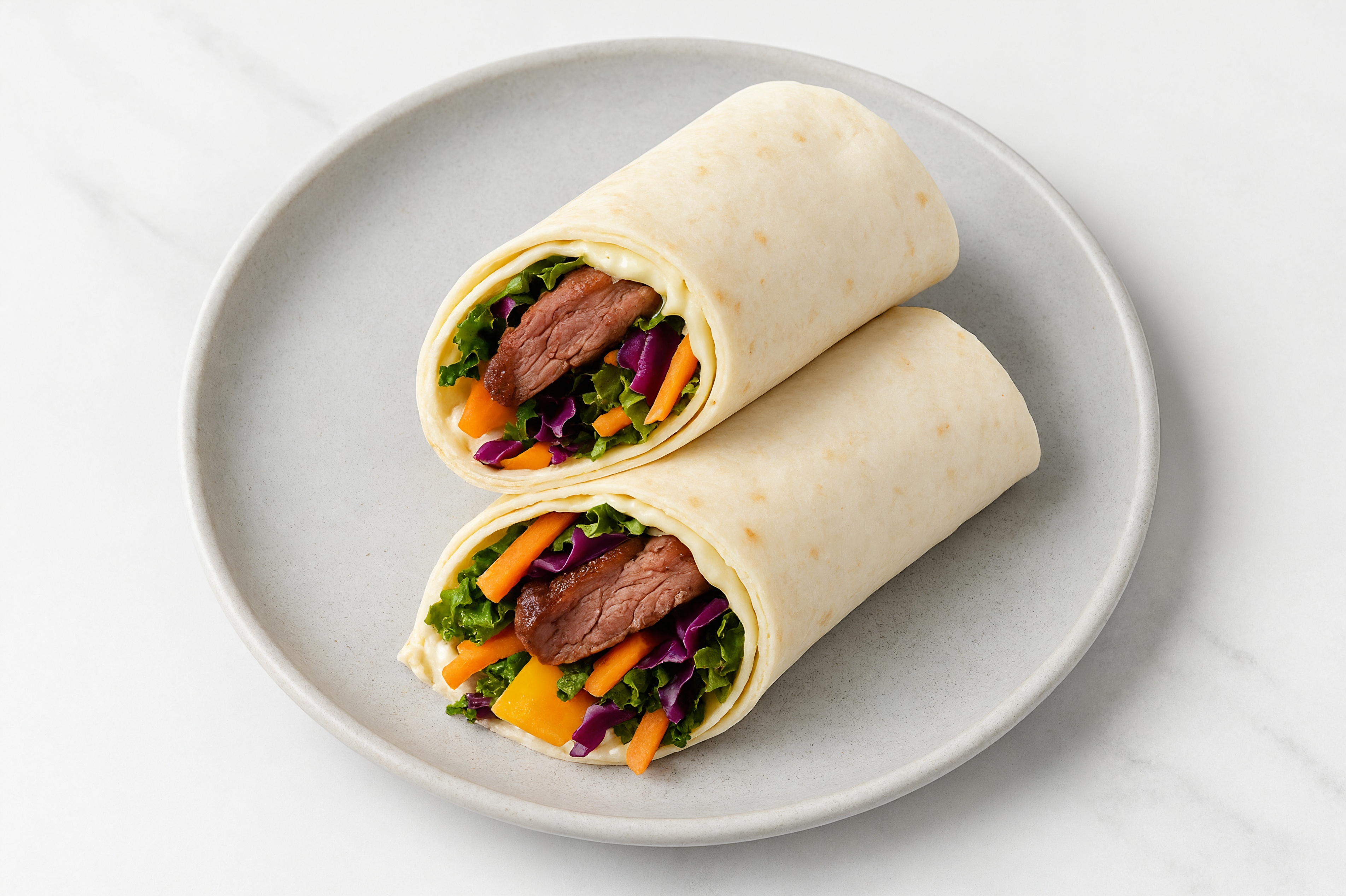Garlic Sliced Steak + Cheddar Wraps with Rainbow Veggies