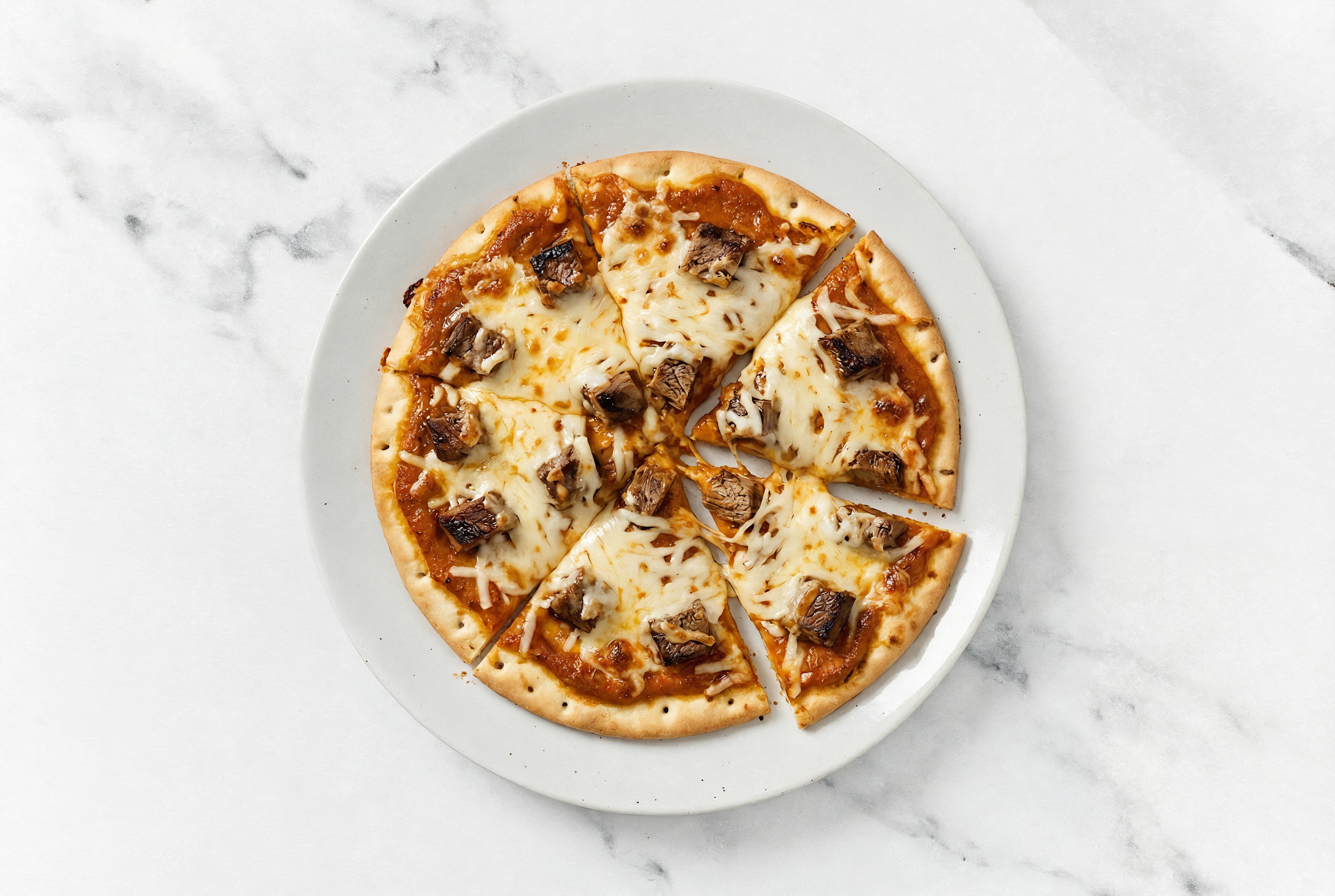 Spiced Tikka Flank Pizza with "Mozzarella"