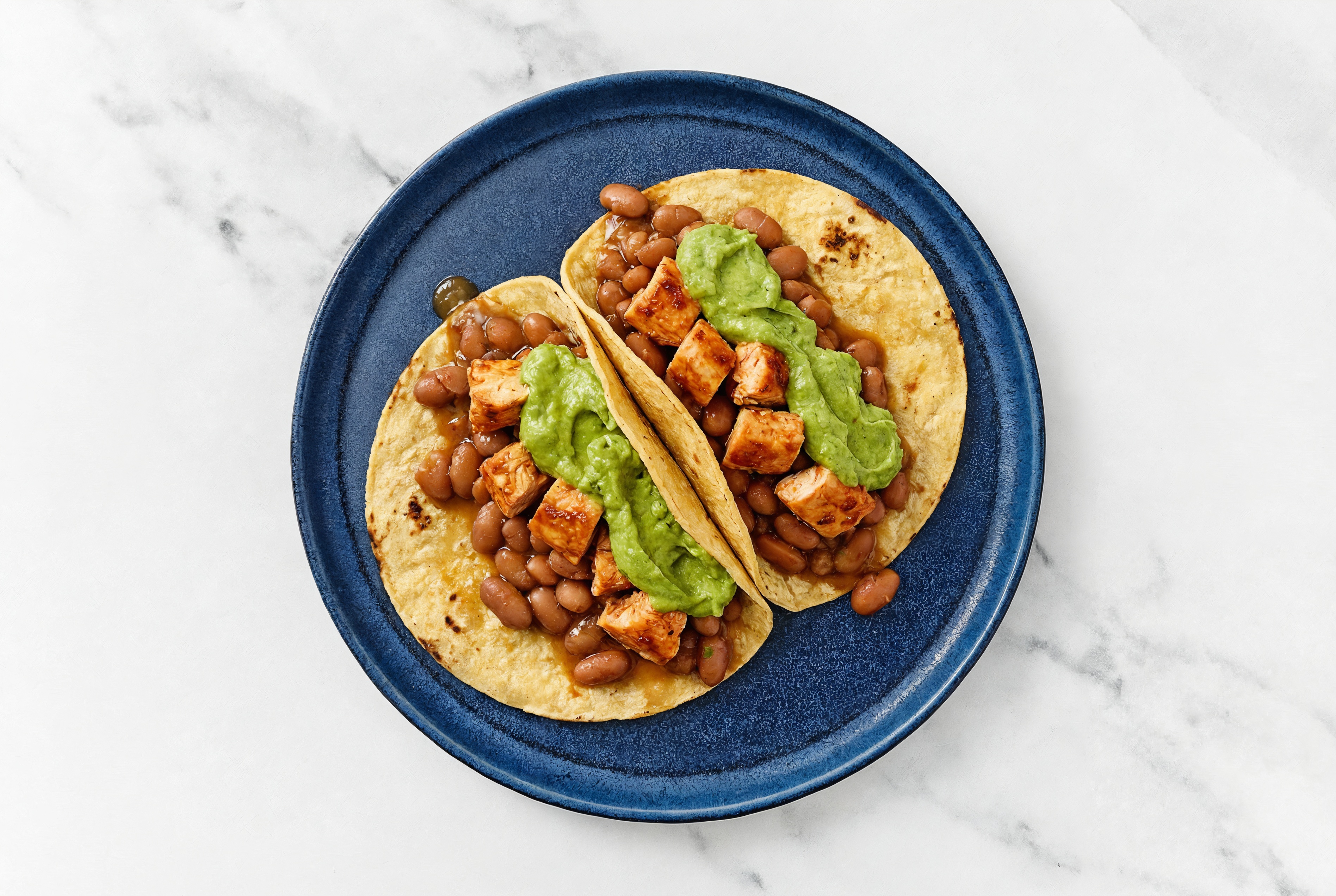 Herby Chipotle Chicken Tacos with Avocado & Pinto Beans