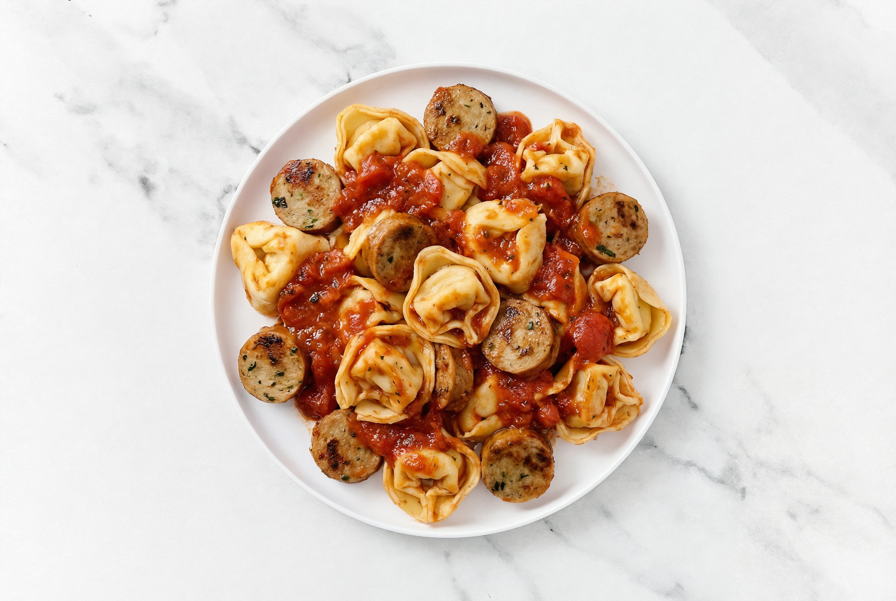 Herby Tortelloni + Sausage in Marinara