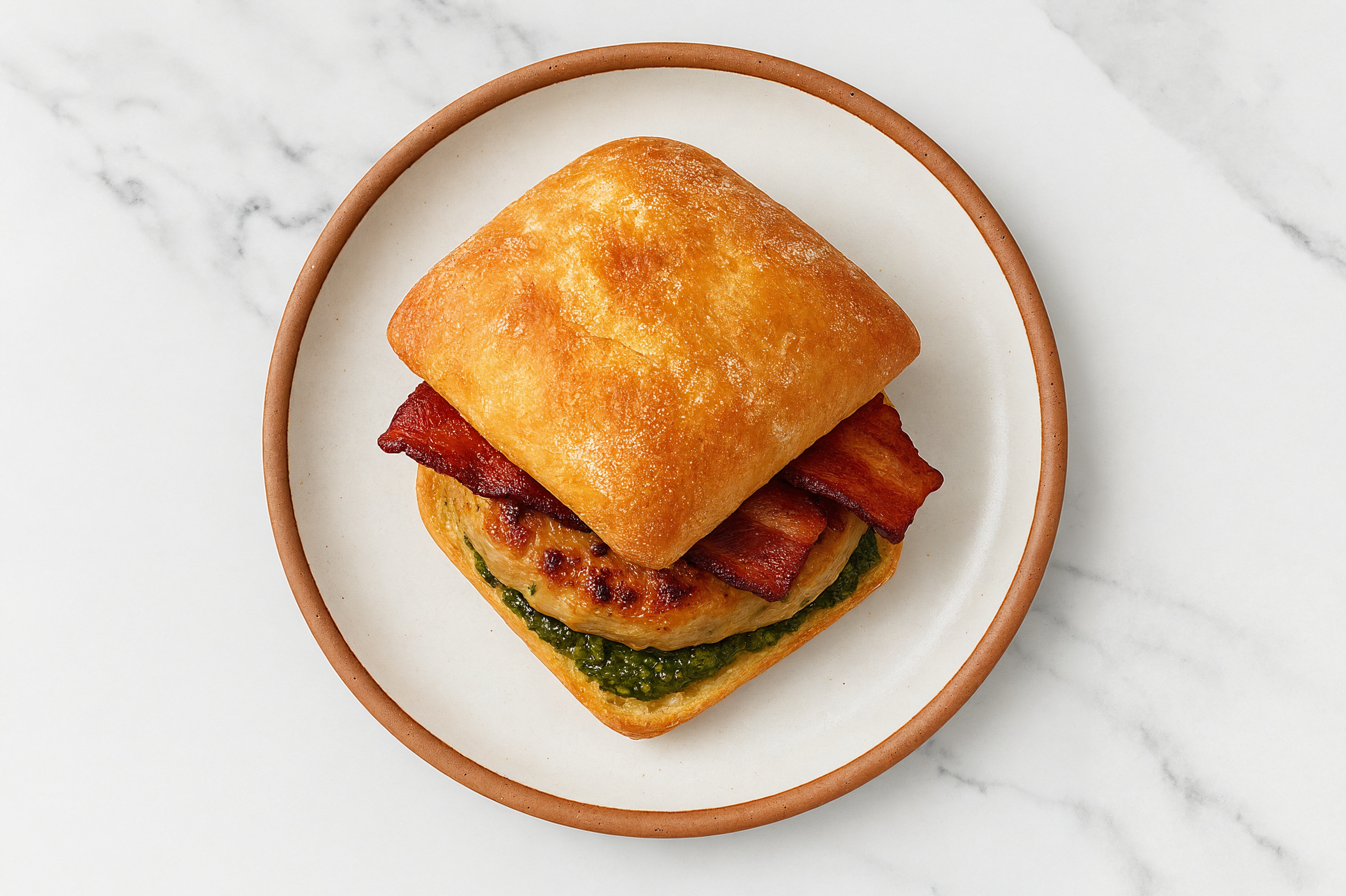Garlic Chicken Burger on Ciabatta with Spinach Pesto & Applewood Smoked Pork Bacon