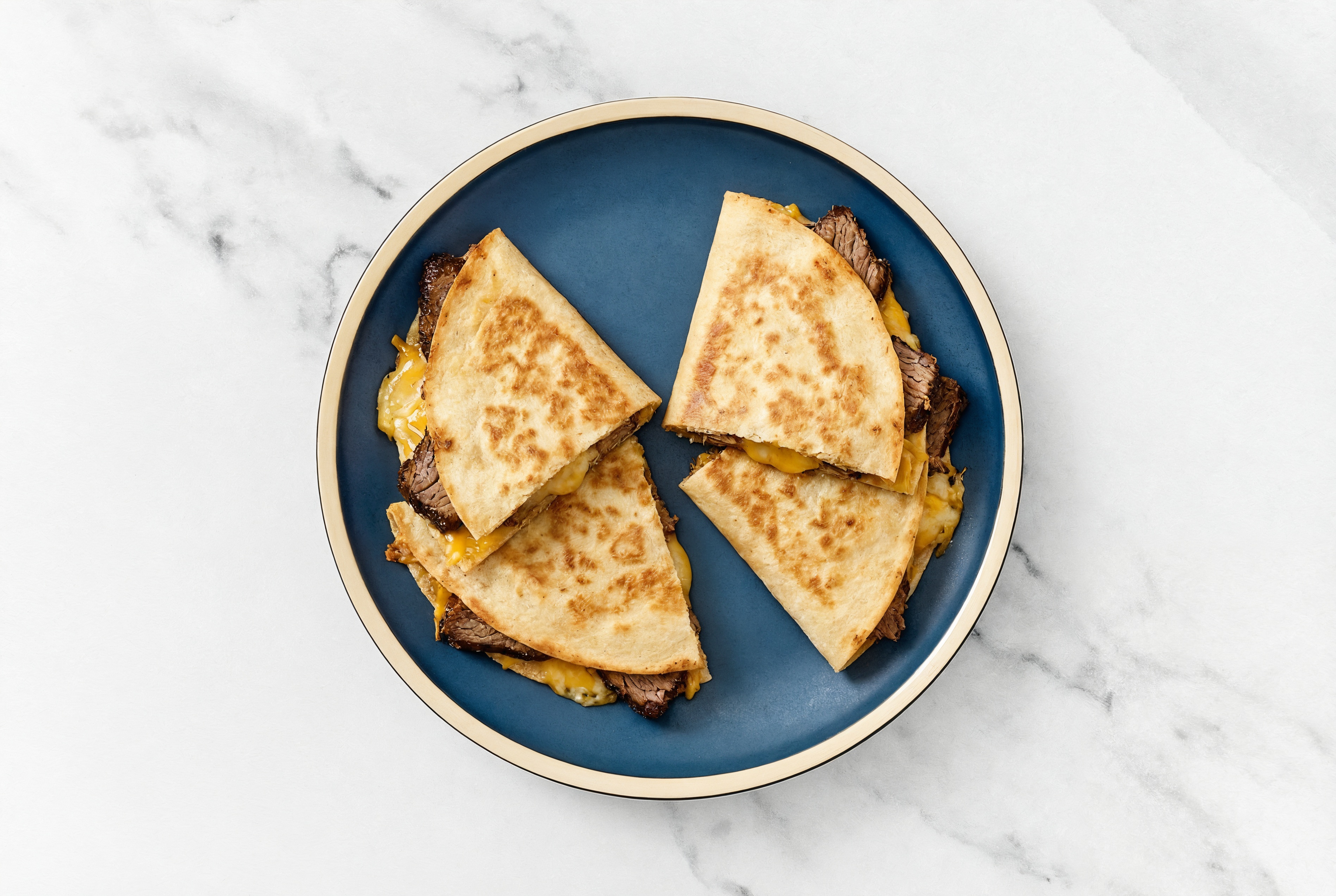 Savory Beef Short Rib Quesadillas with Shredded Sharp Cheddar Cheese