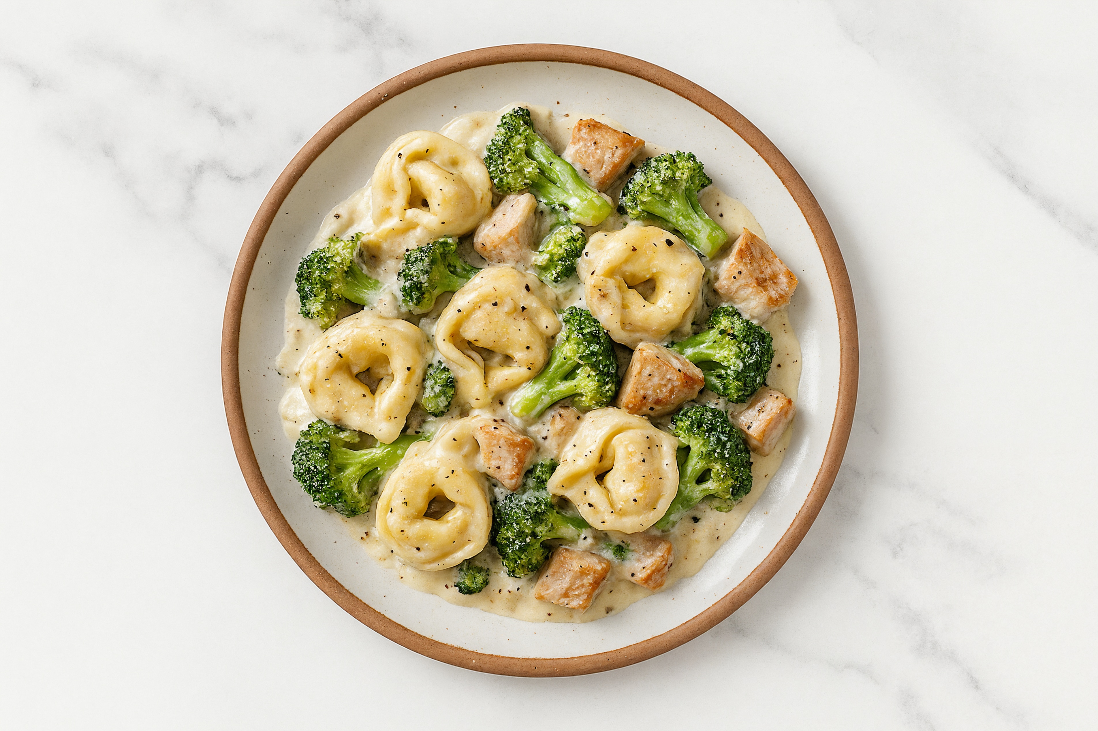 Alfredo Tortelloni with Pork Chops & Broccoli