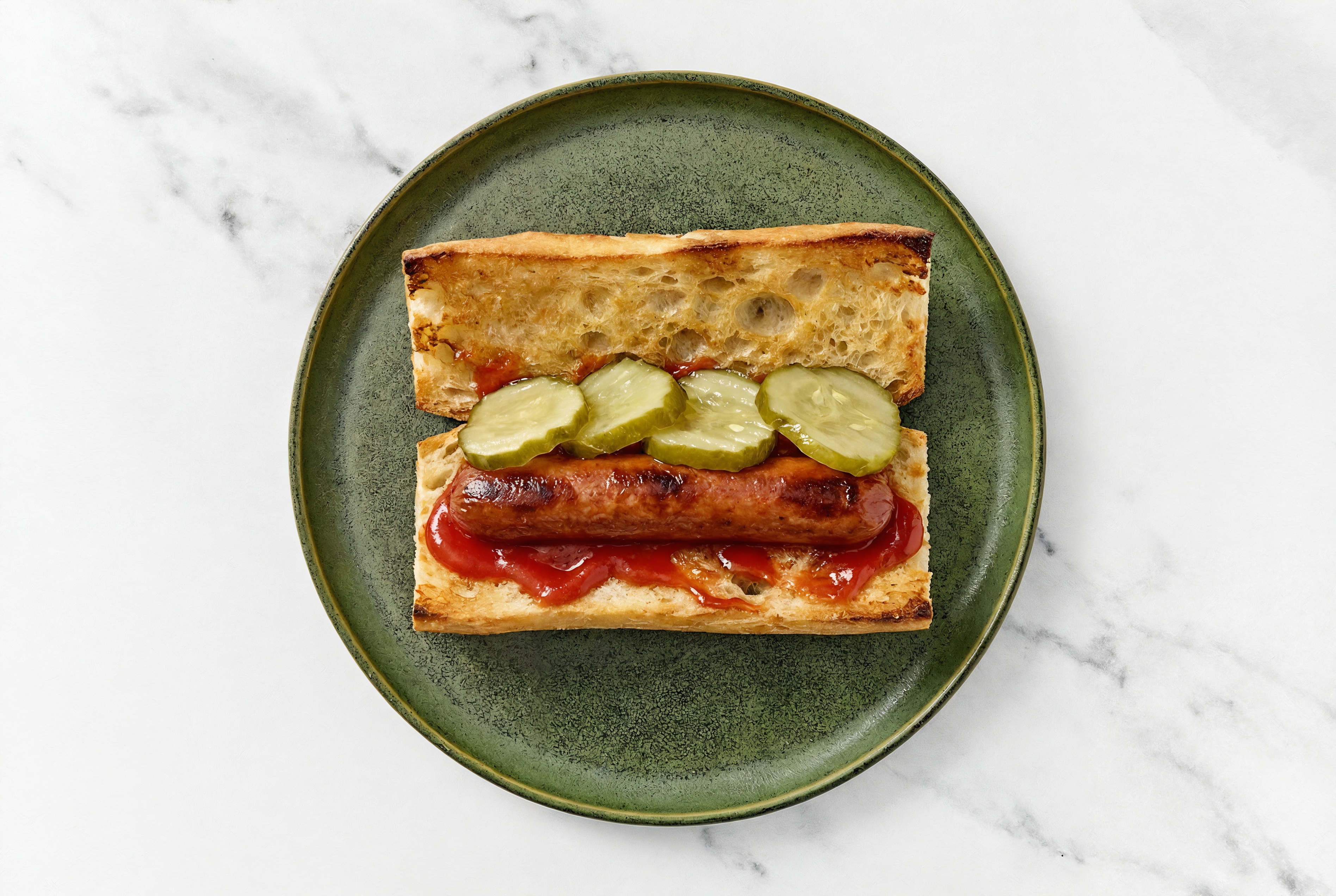 Pickle Beef Hot Dog with Ketchup on Baguette