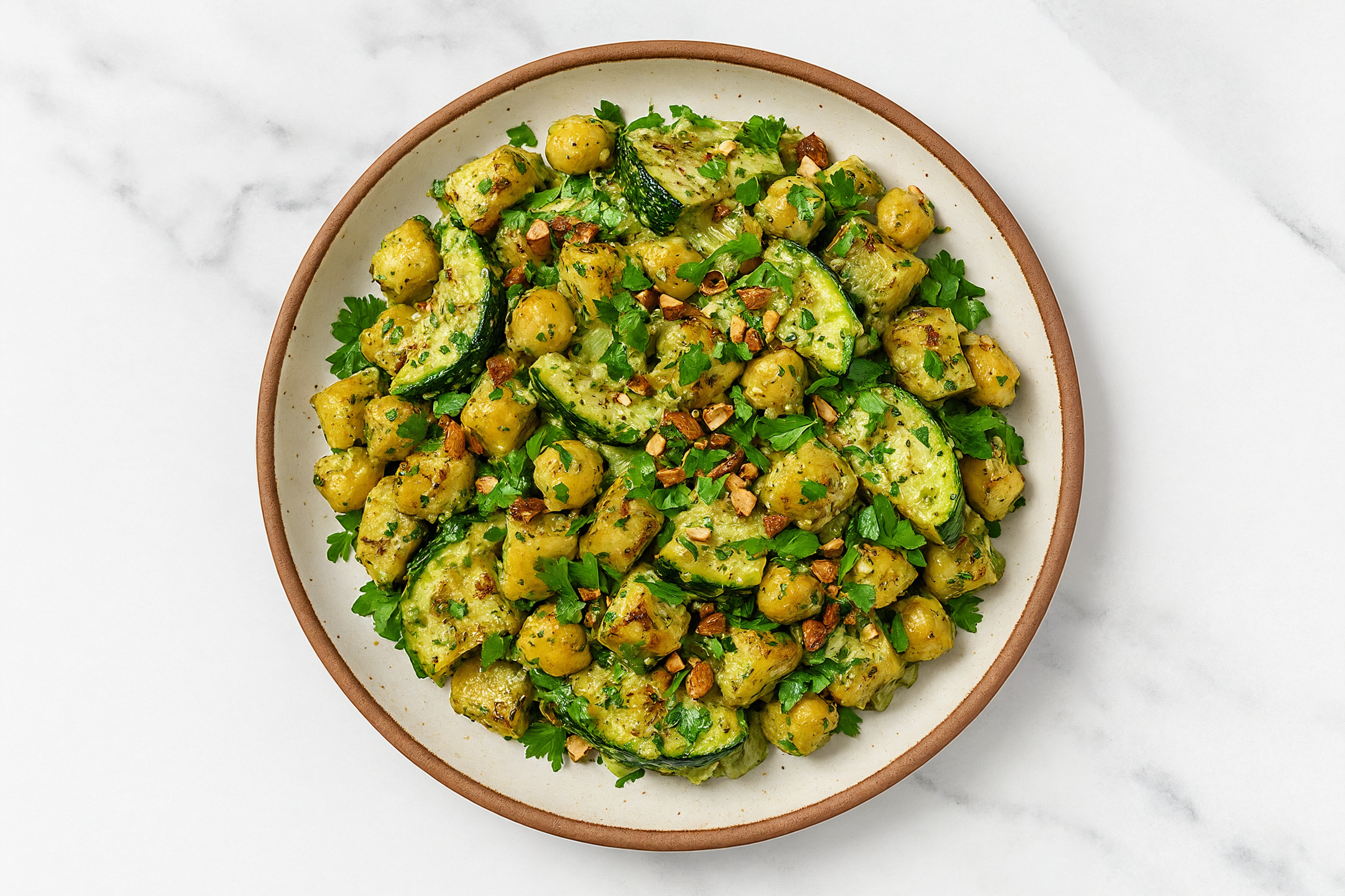 Garbanzo Beans + Zucchini with Spinach Artichoke Sauce + Chopped Almonds over Potatoes