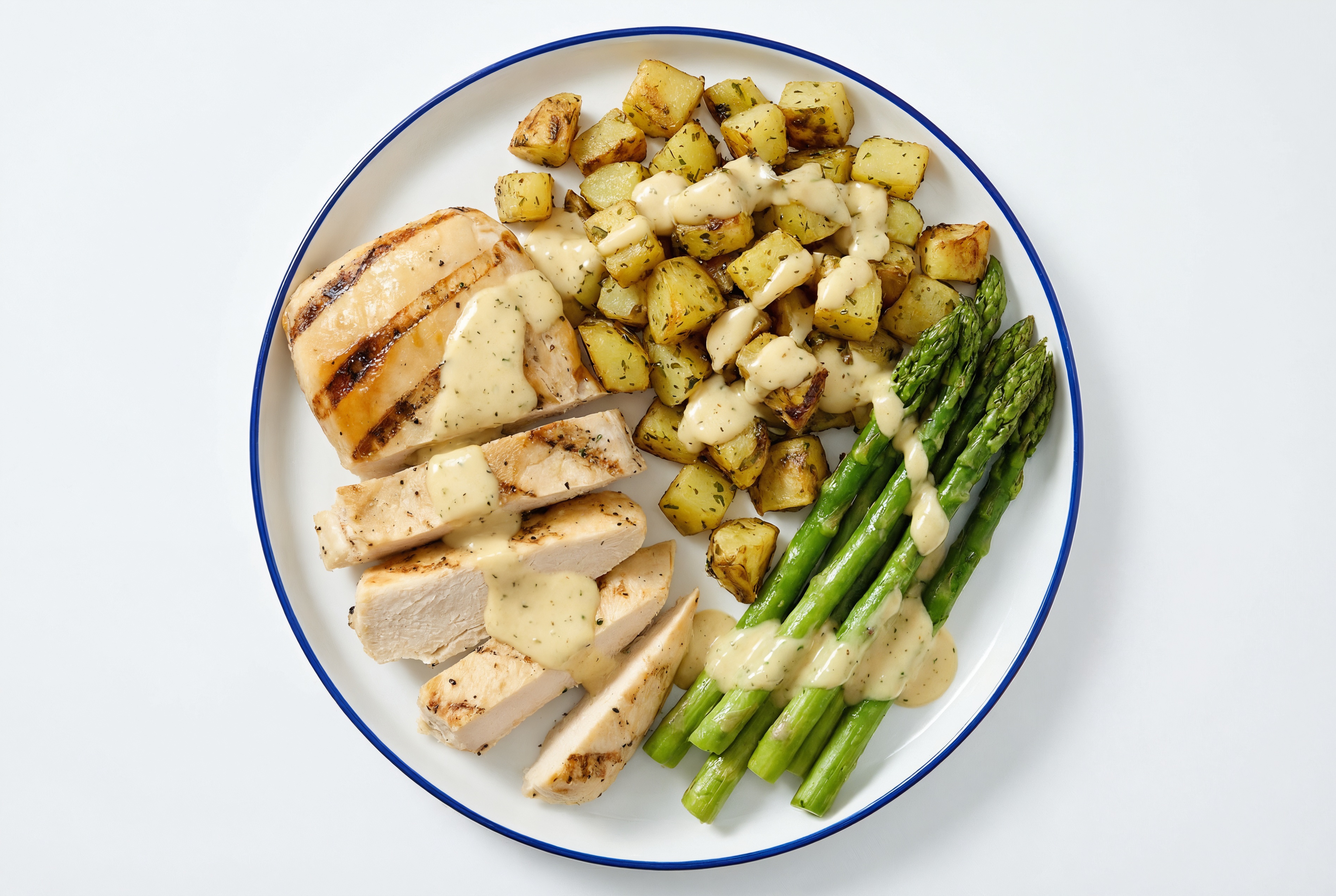 Caesar Grilled Seasoned Chicken Breast with Herbed Potatoes + Asparagus