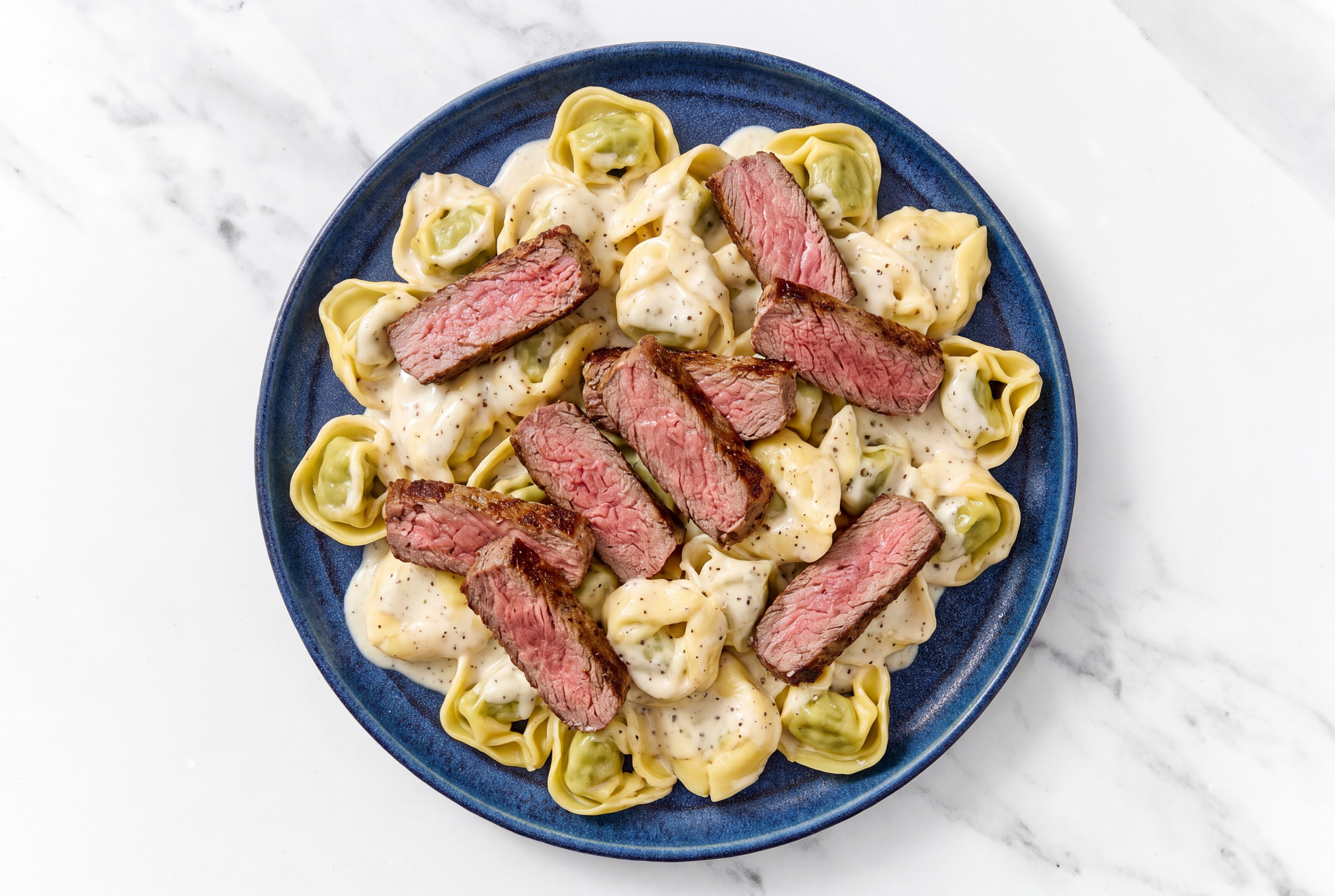 Steakhouse Cheese Tortellini Alfredo with Beef Sirloin Steak