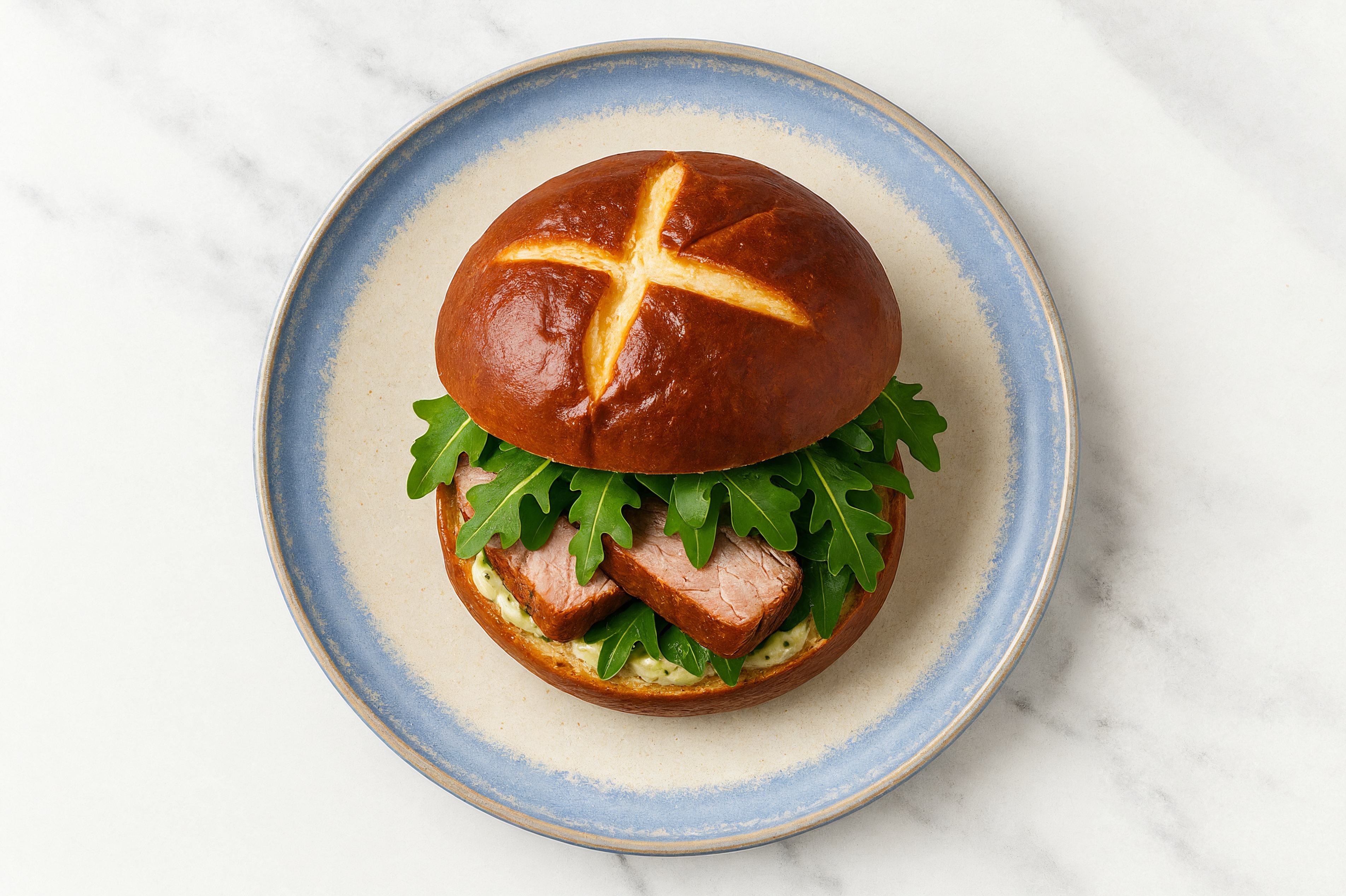 Dill Pickle Tuna Sandwich on Pretzel Bun with Arugula