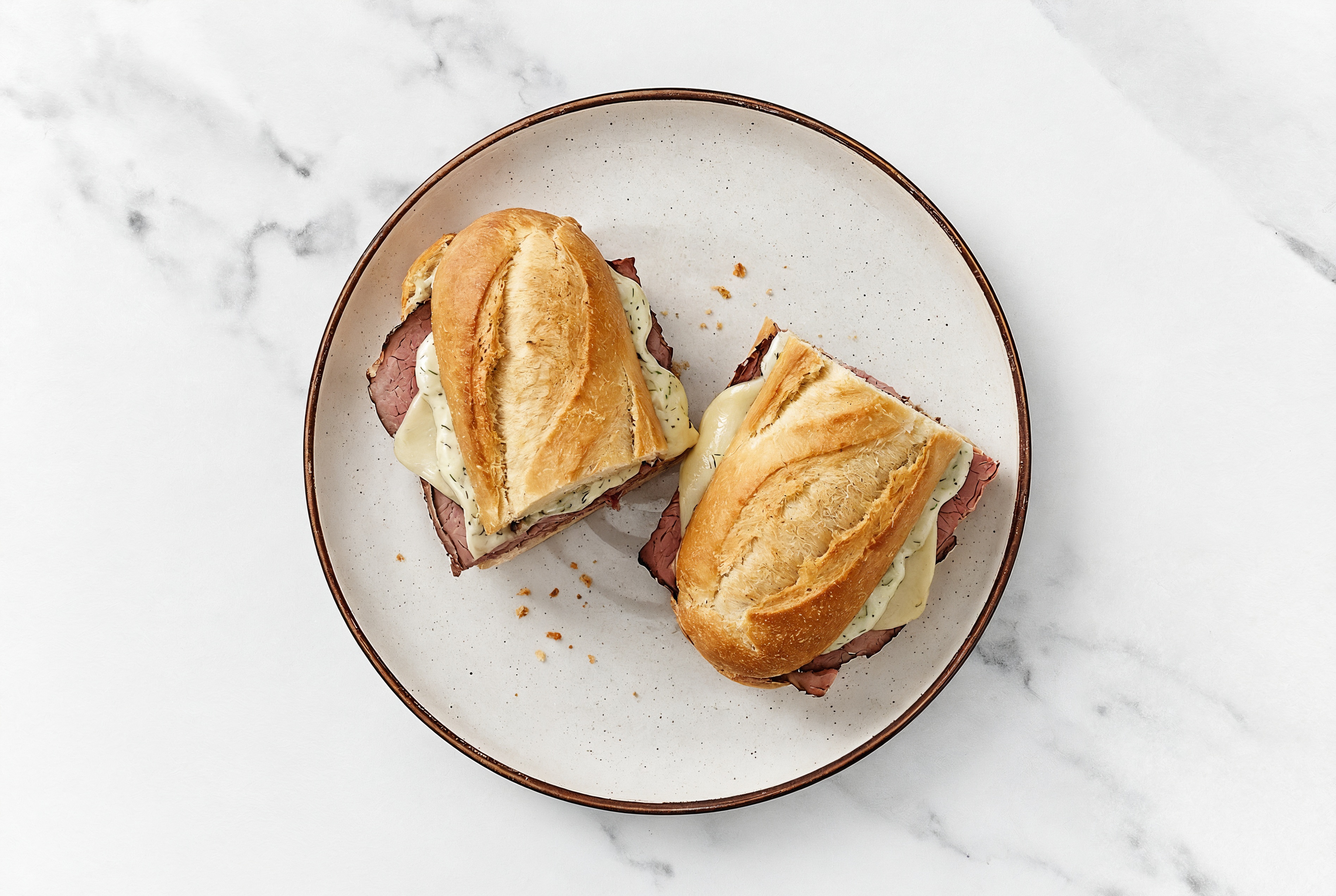Roast Beef + Havarti on Baguette with Dill Pickle Garlic Sauce