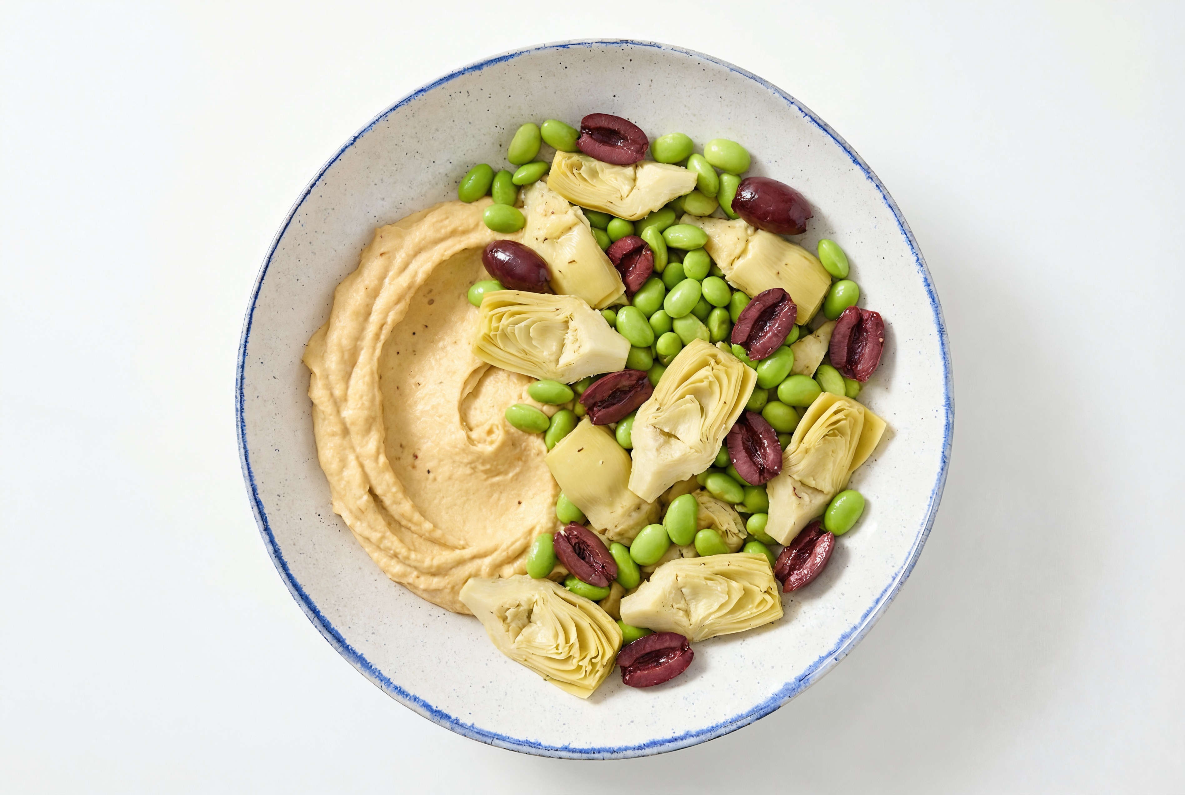 Olive Artichoke Edamame Bowl over Onion Hummus