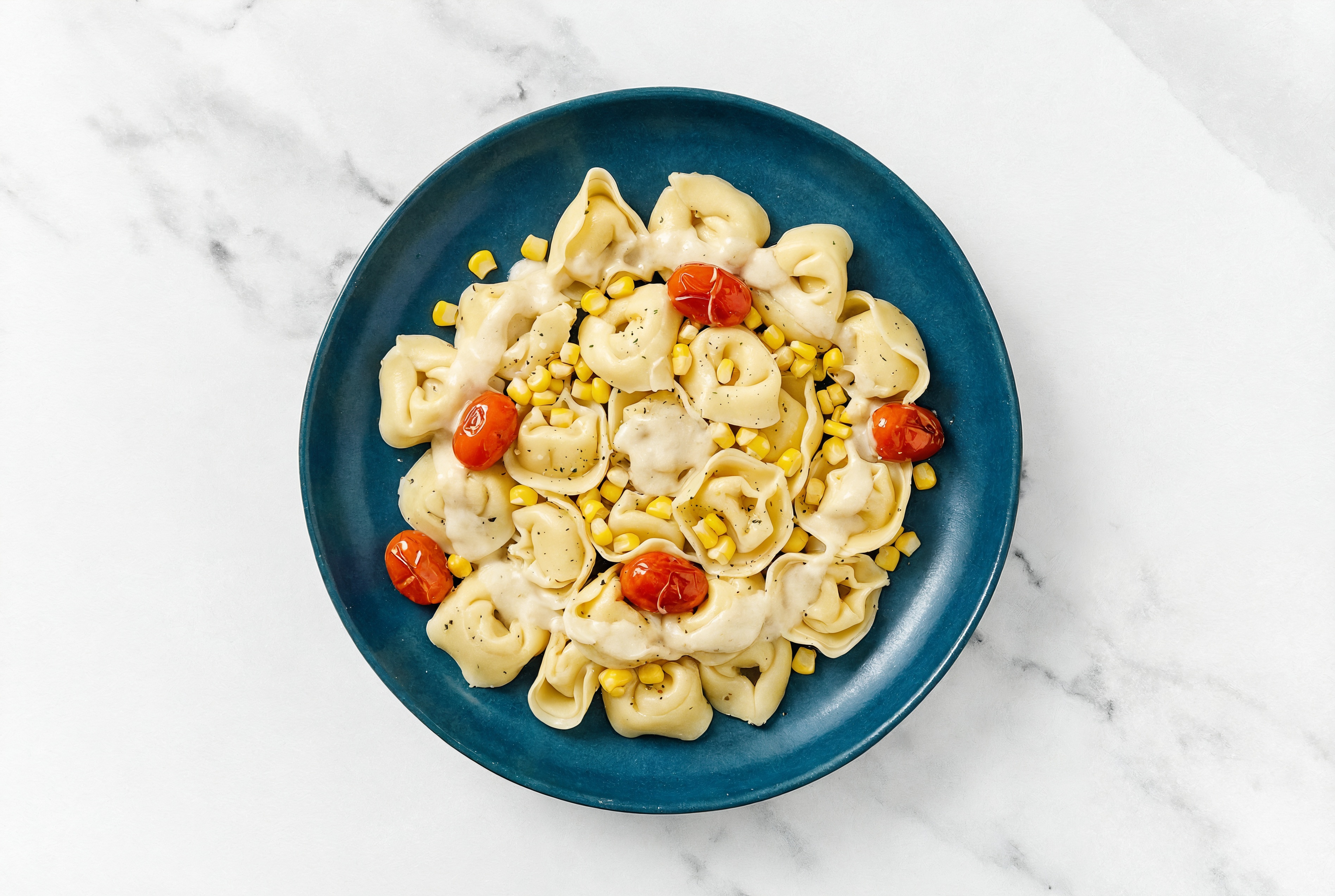 Creamy Garlic Summer Veggie Tortelloni
