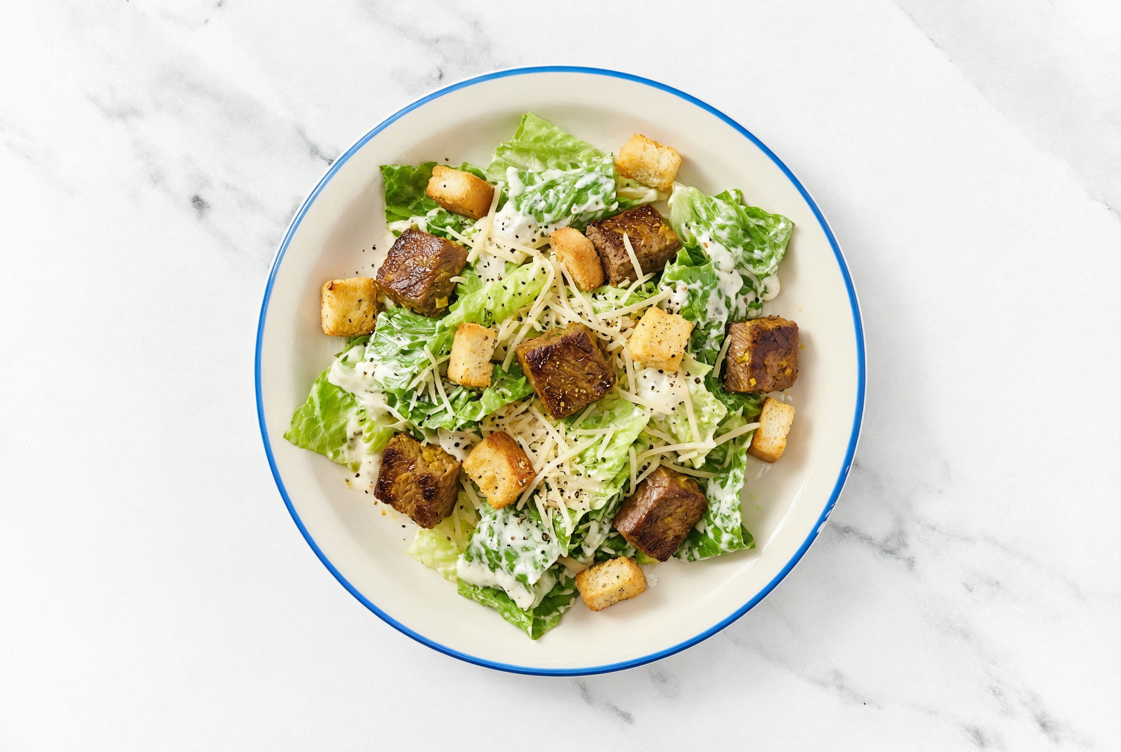 Seasoned Bison Caesar Salad with Madras Curry Powder