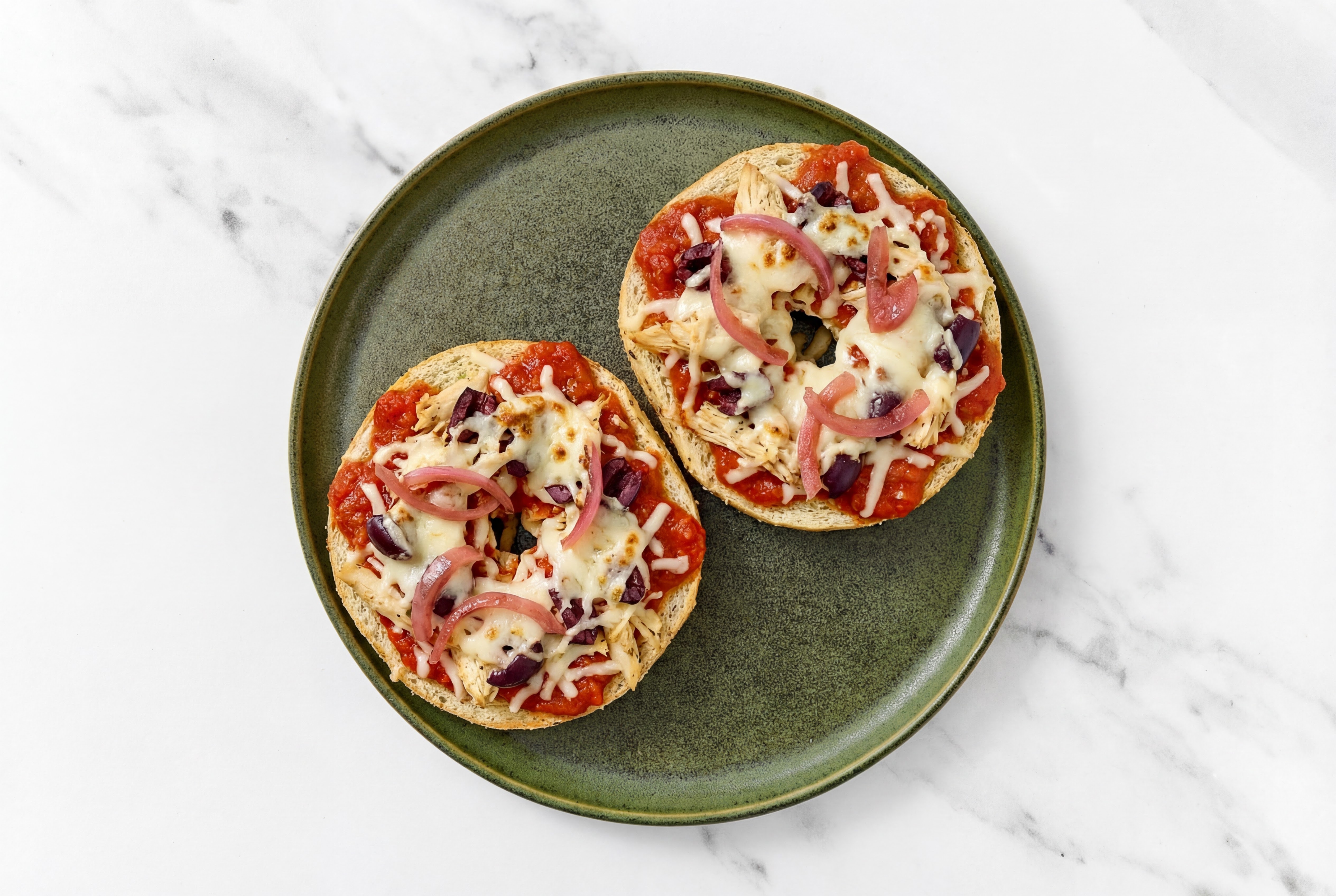 Classic Pulled Chicken + Olives Pizza Gluten Free Seeded Herb & Garlic Bagels with Pickled Onion