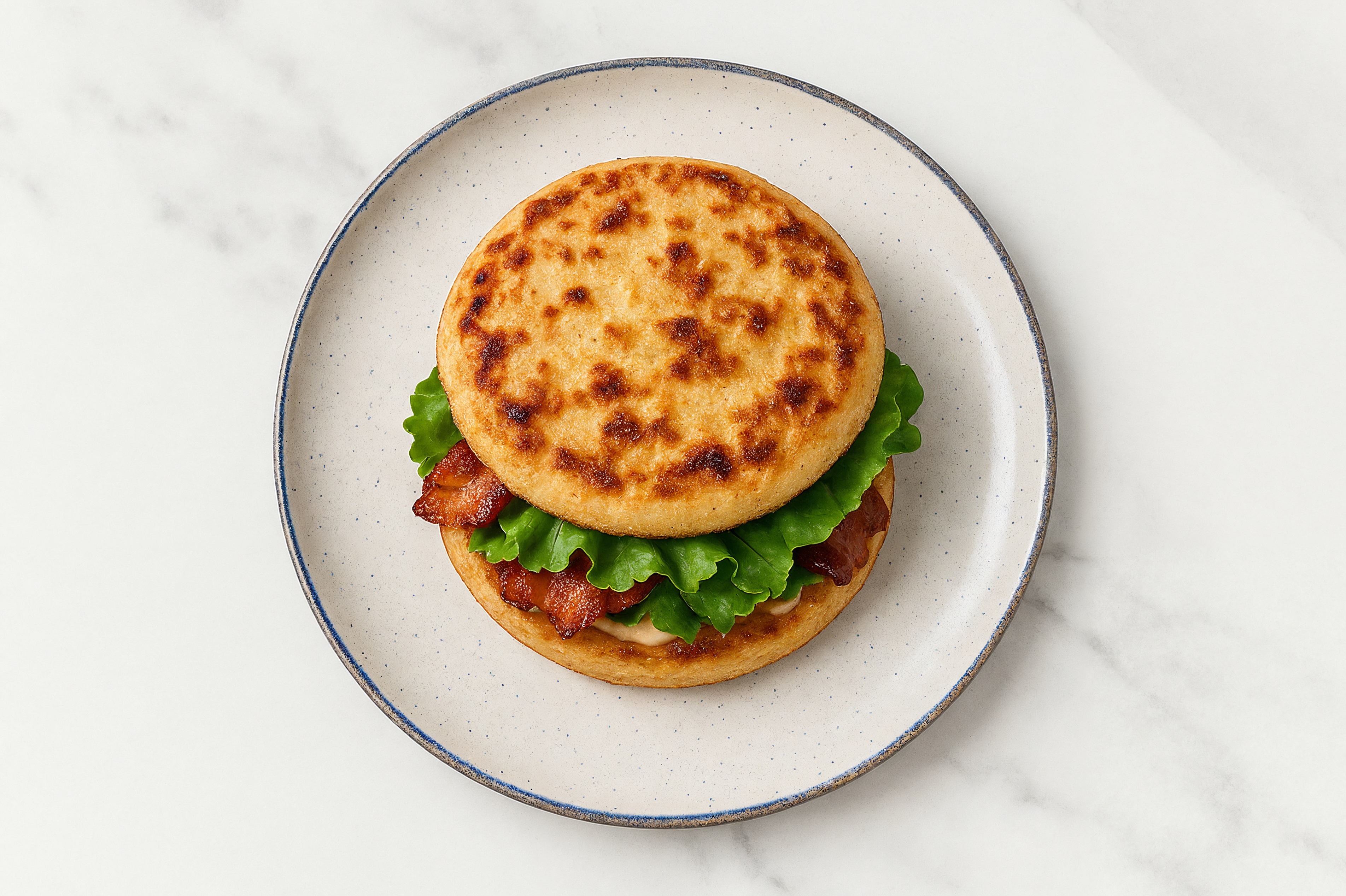 Creamy Horseradish Applewood Smoked Pork Bacon Sandwich with Green Leaf Lettuce on Cauliflower Rounds