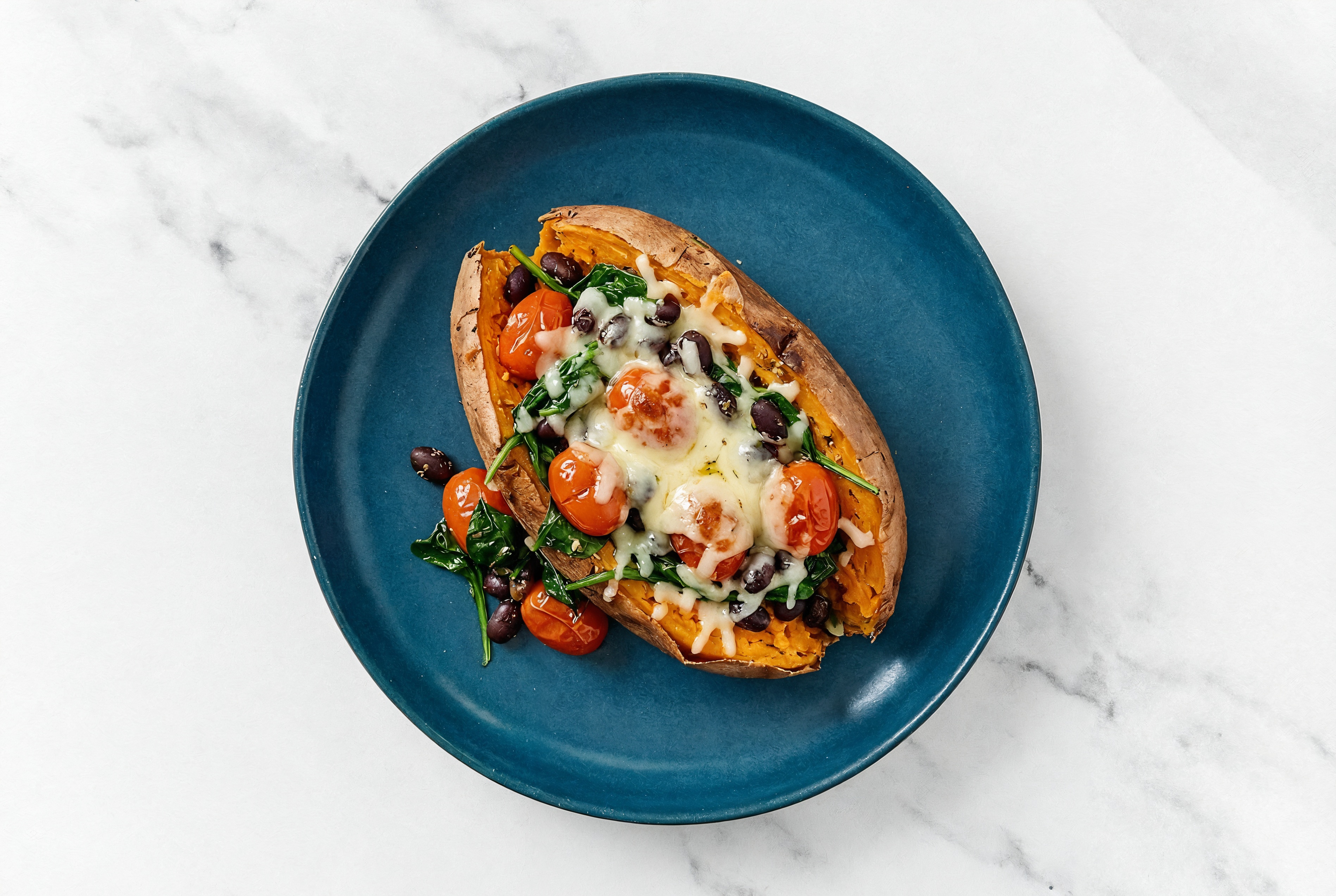 Sweet Potato Stuffed with Black Beans + Spinach
