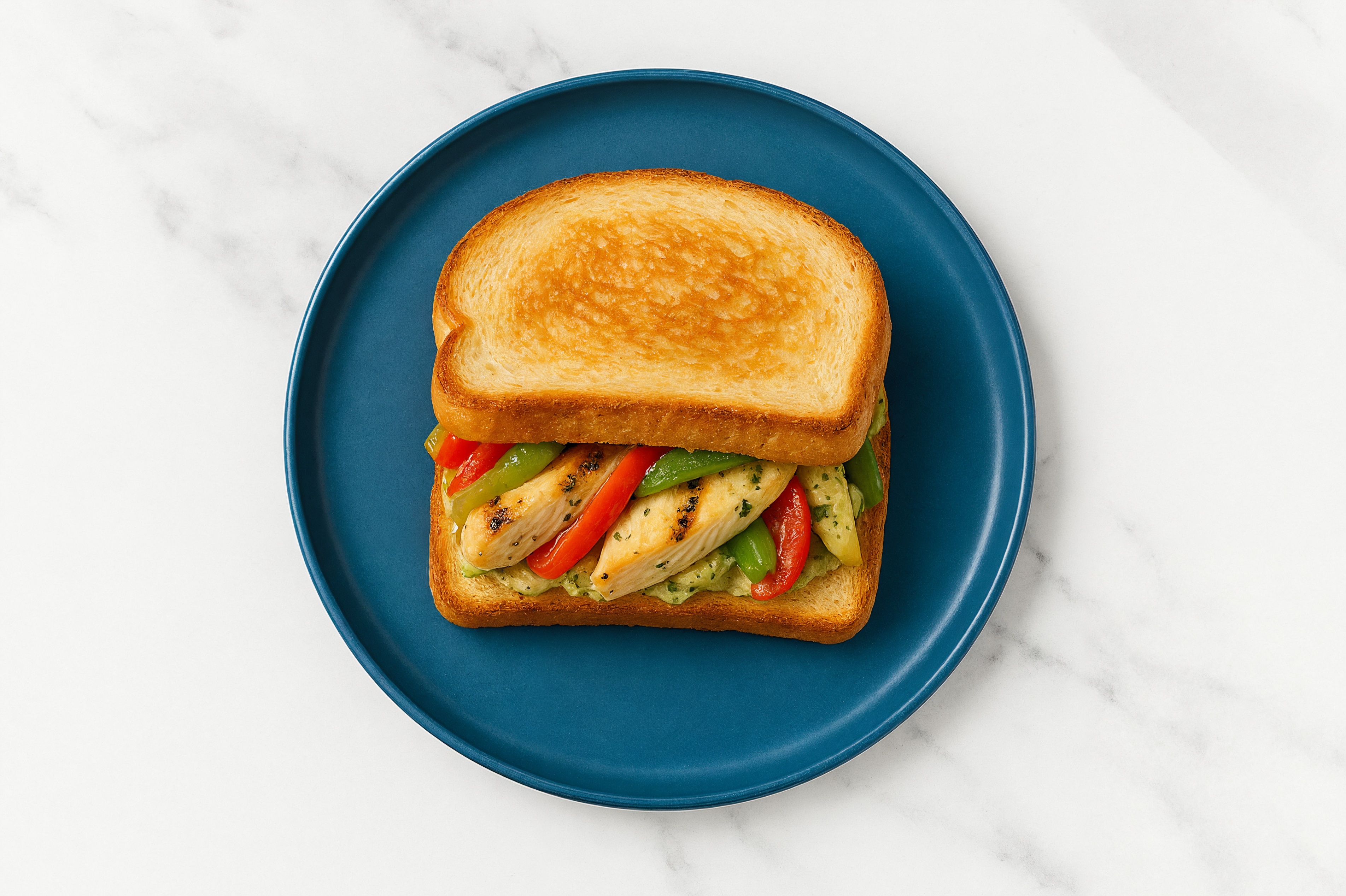 Creamy Artichoke Grilled Chicken Sandwich with Peppers + Onion on Honey White Bread