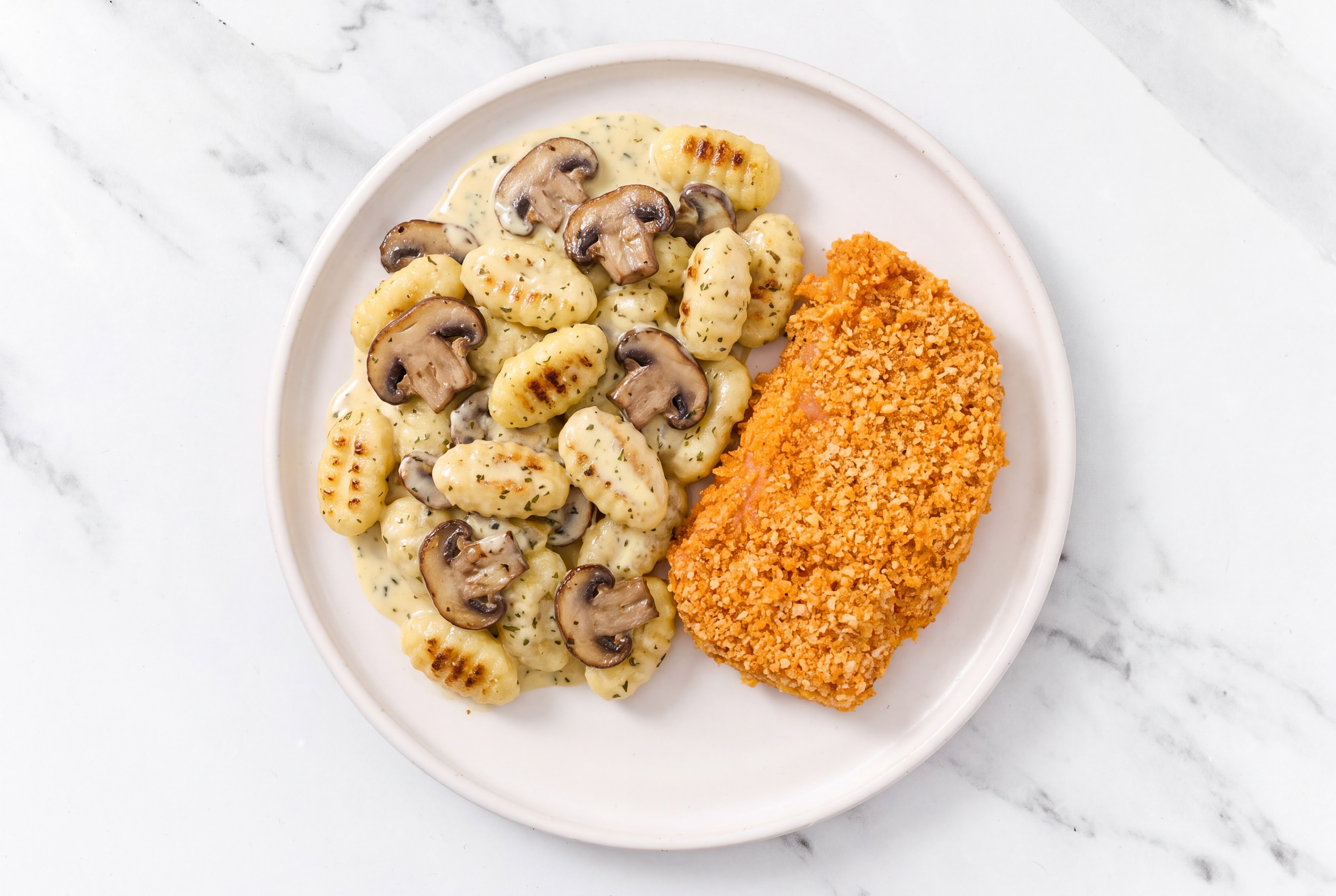 Crispy Hot Honey Chicken over Creamy Gnocchi with Baby Bella Mushrooms