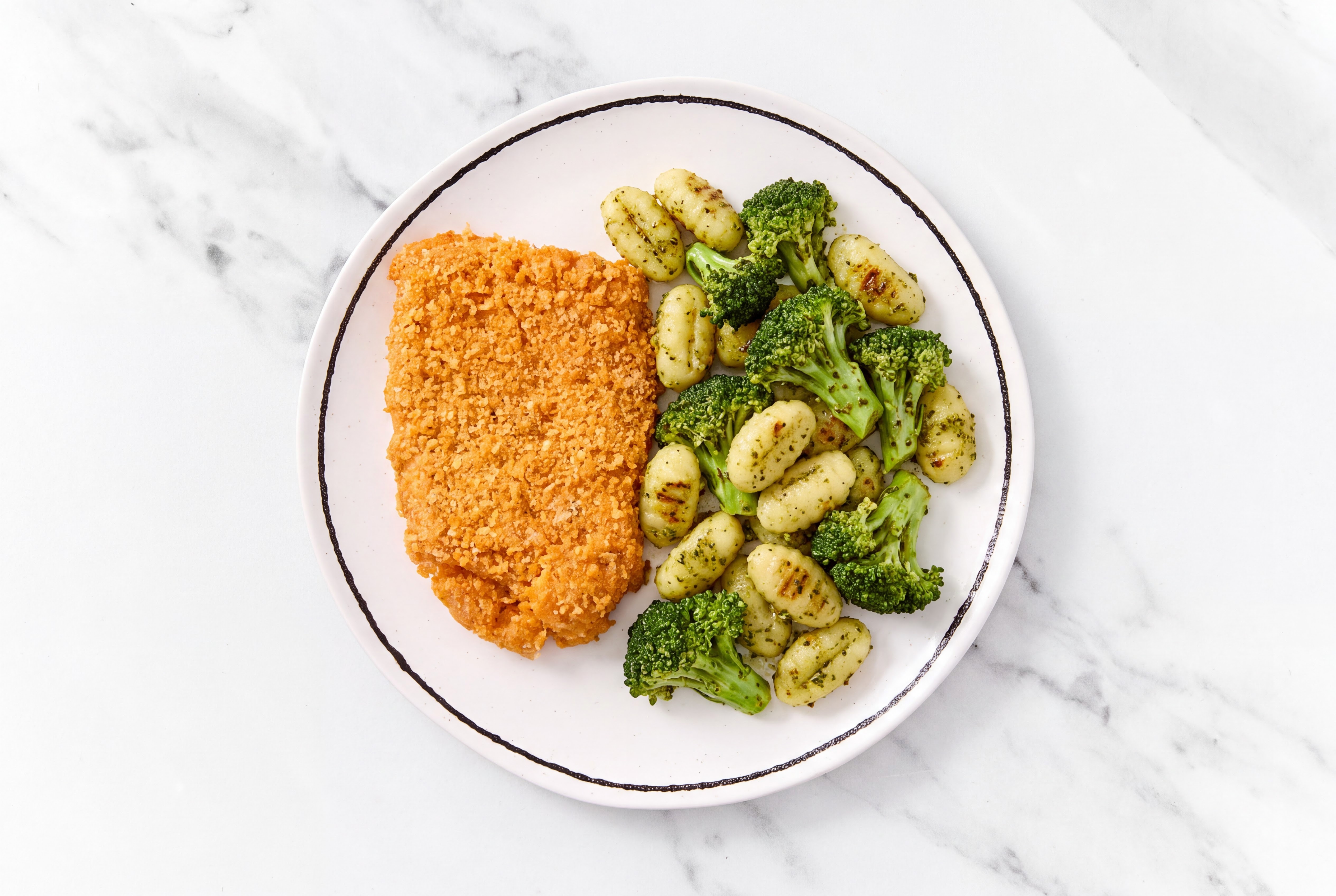 Crispy Hot Honey Chicken over Pesto Gnocchi with Broccoli