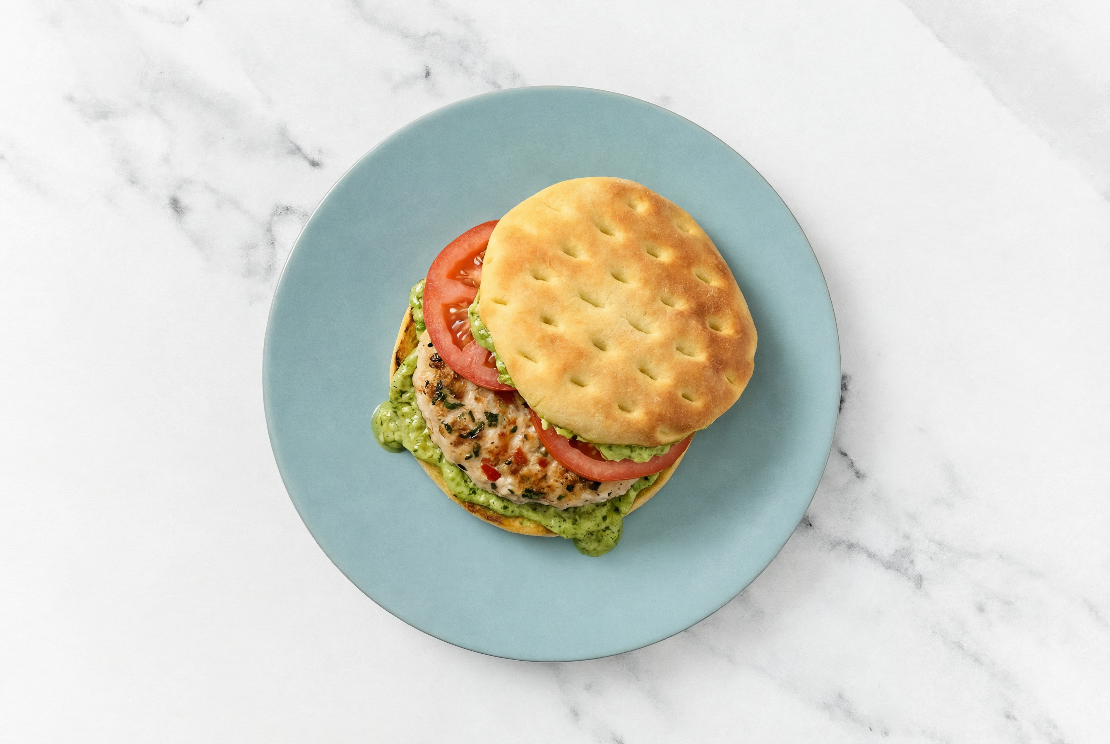 Herby Bruschetta Chicken Patties with Tomatoes + Pesto Aioli on Brioche Buns