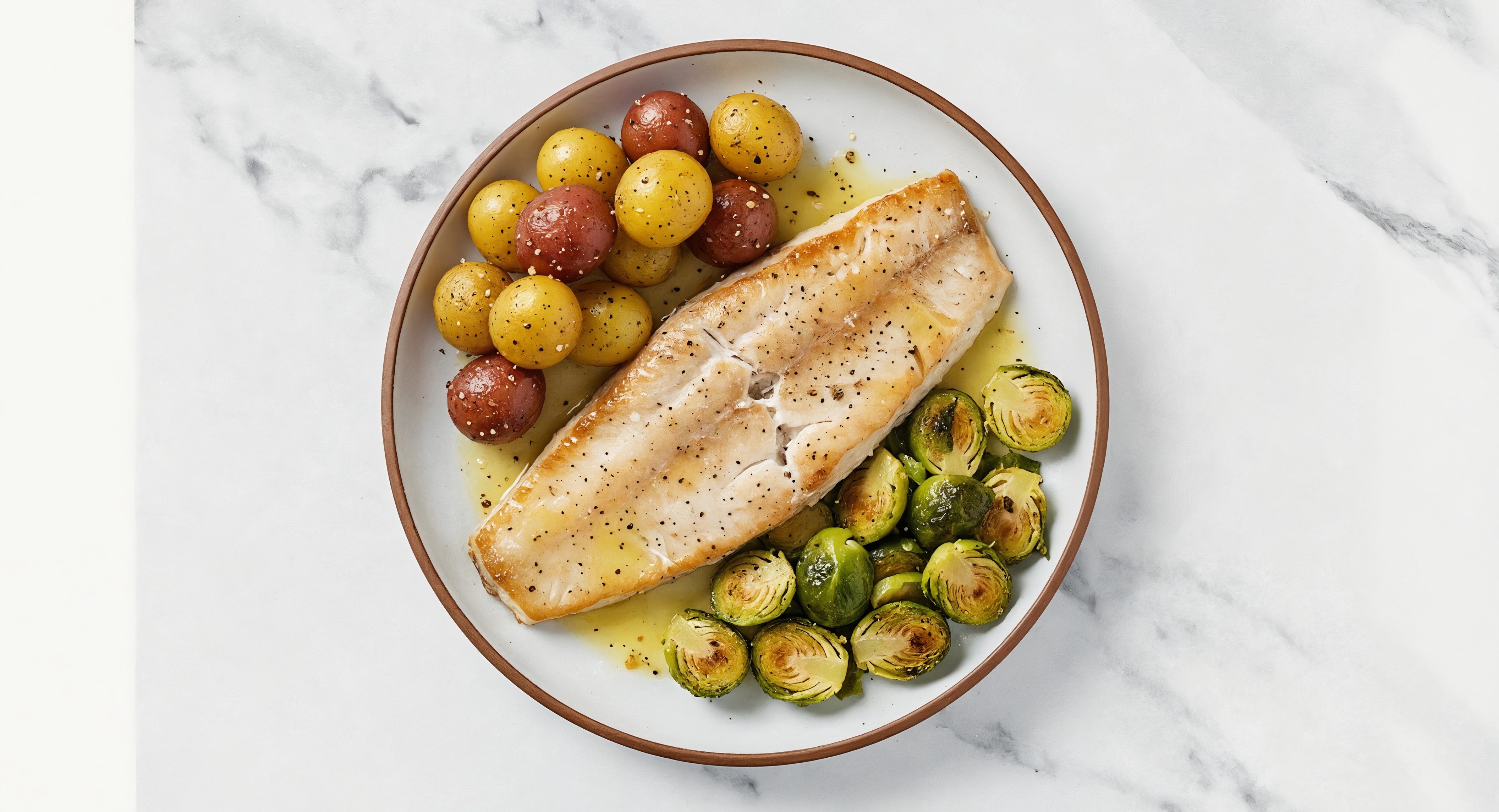 Lemon-Slow Churned Pasture Butter Trout with Creamer Potatoes & Brussels