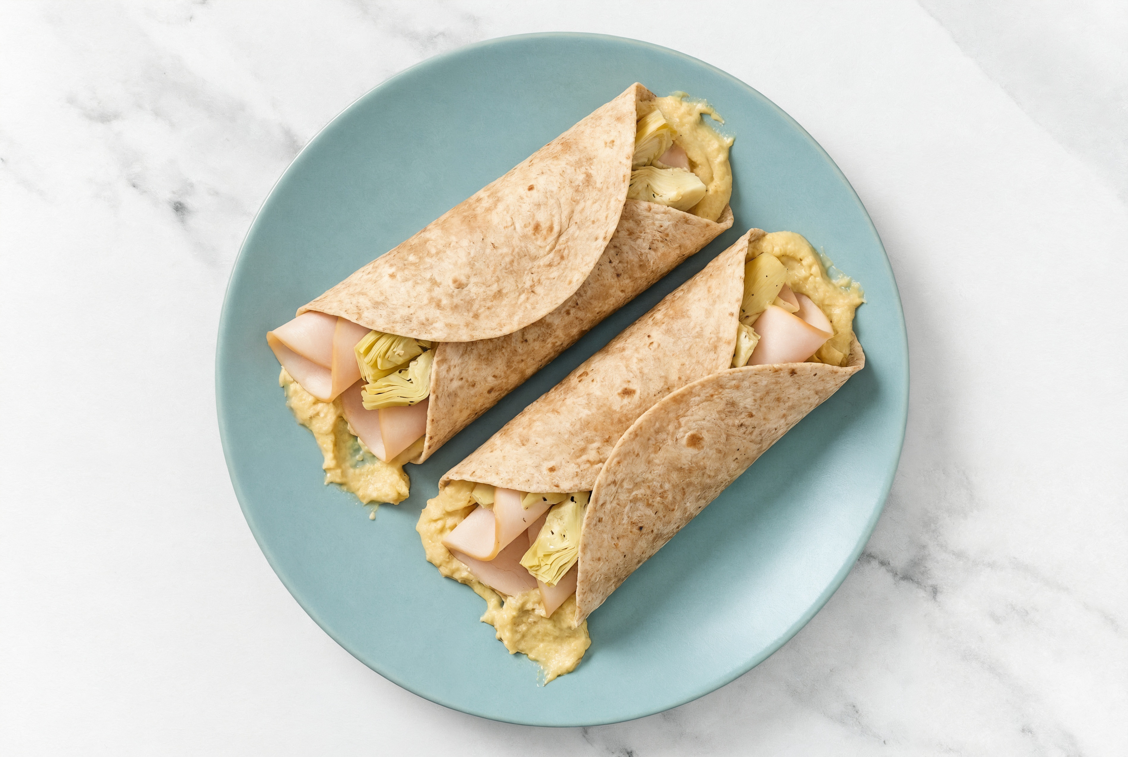 Mediterranean-Inspired Oven Roasted Turkey Breast + Olive Oil Sea Salt Hummus Wrap