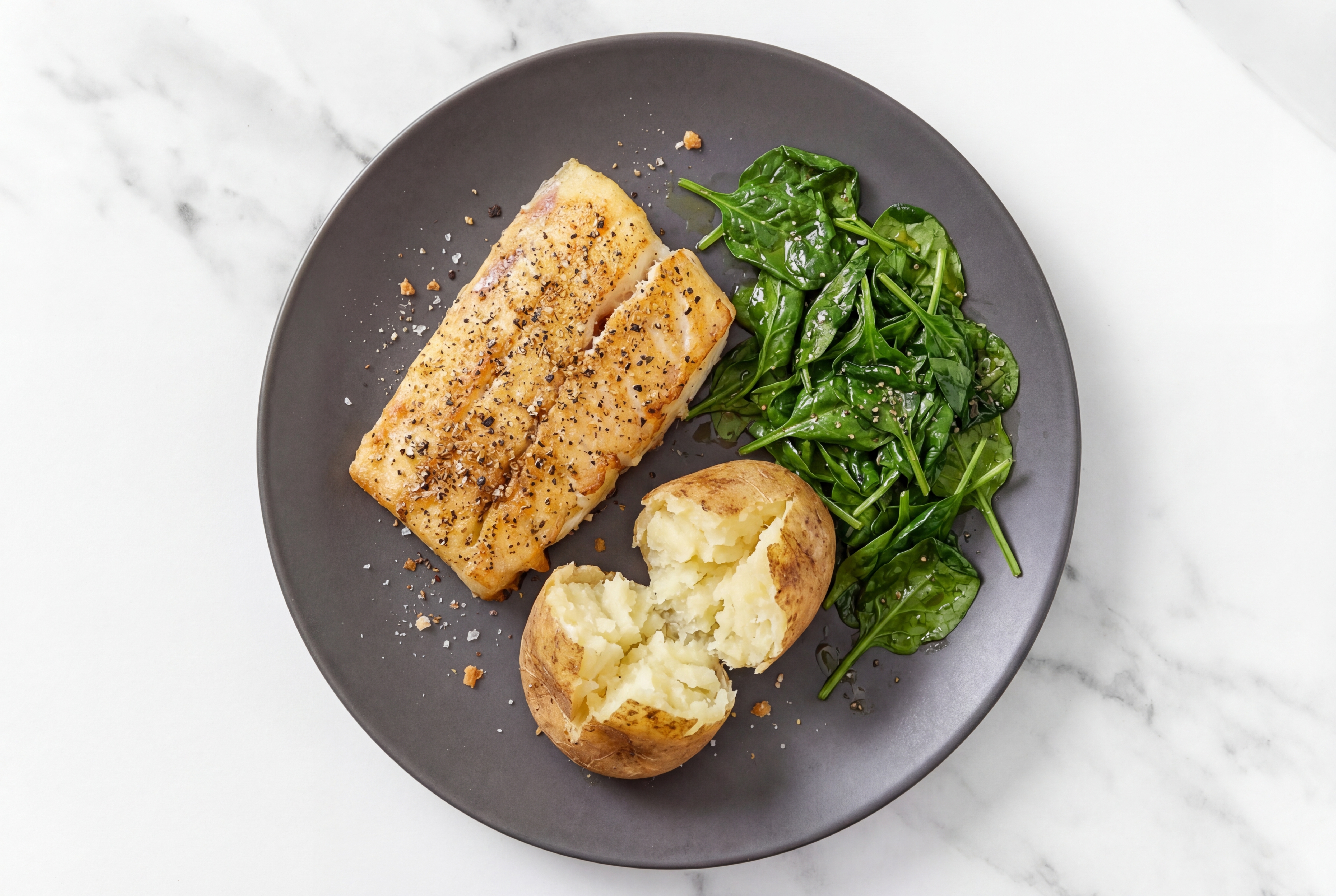 Roasted Honey Herb Barramundi with Sautéed Baby Spinach