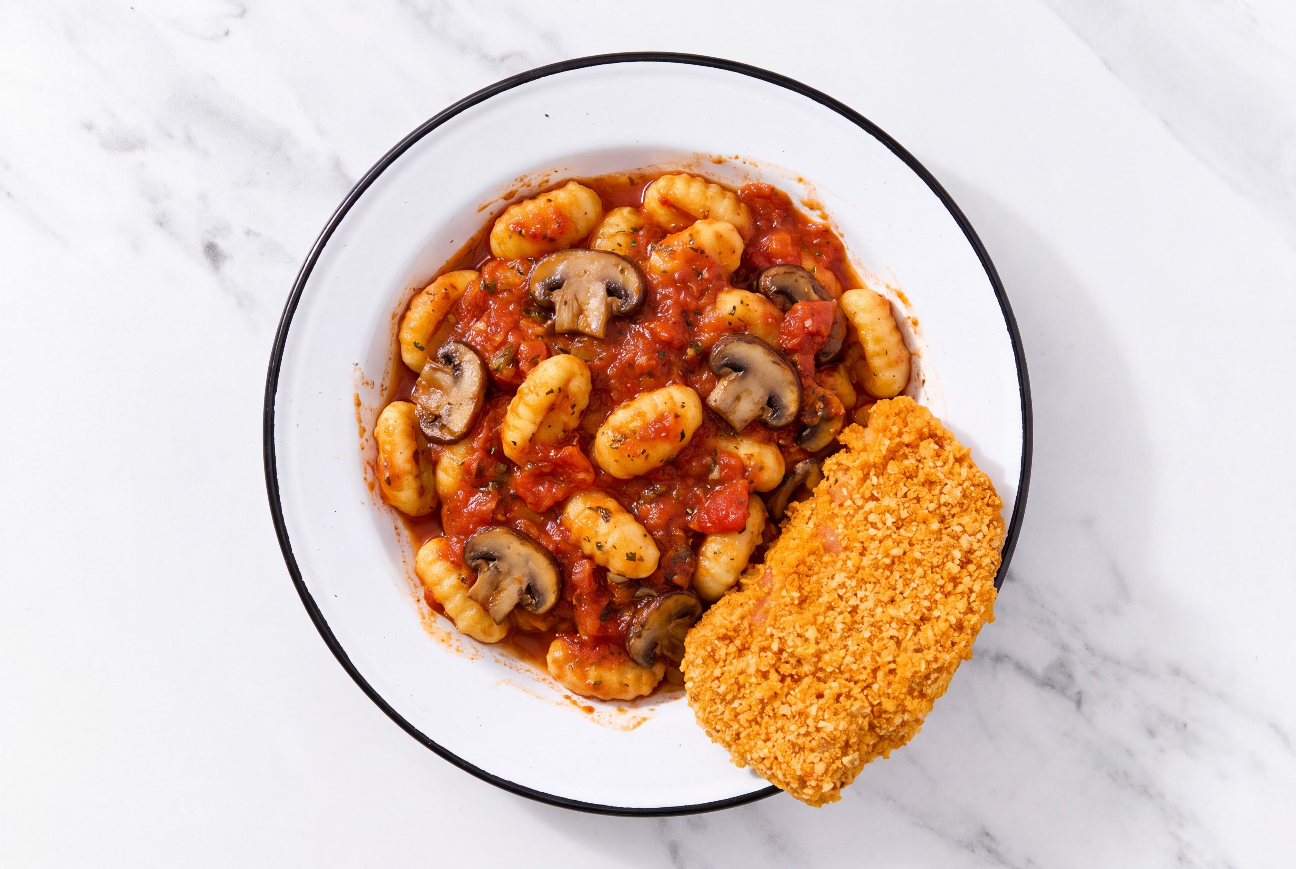 Crispy Hot Honey Chicken over Marinara Gnocchi with Baby Bella Mushrooms