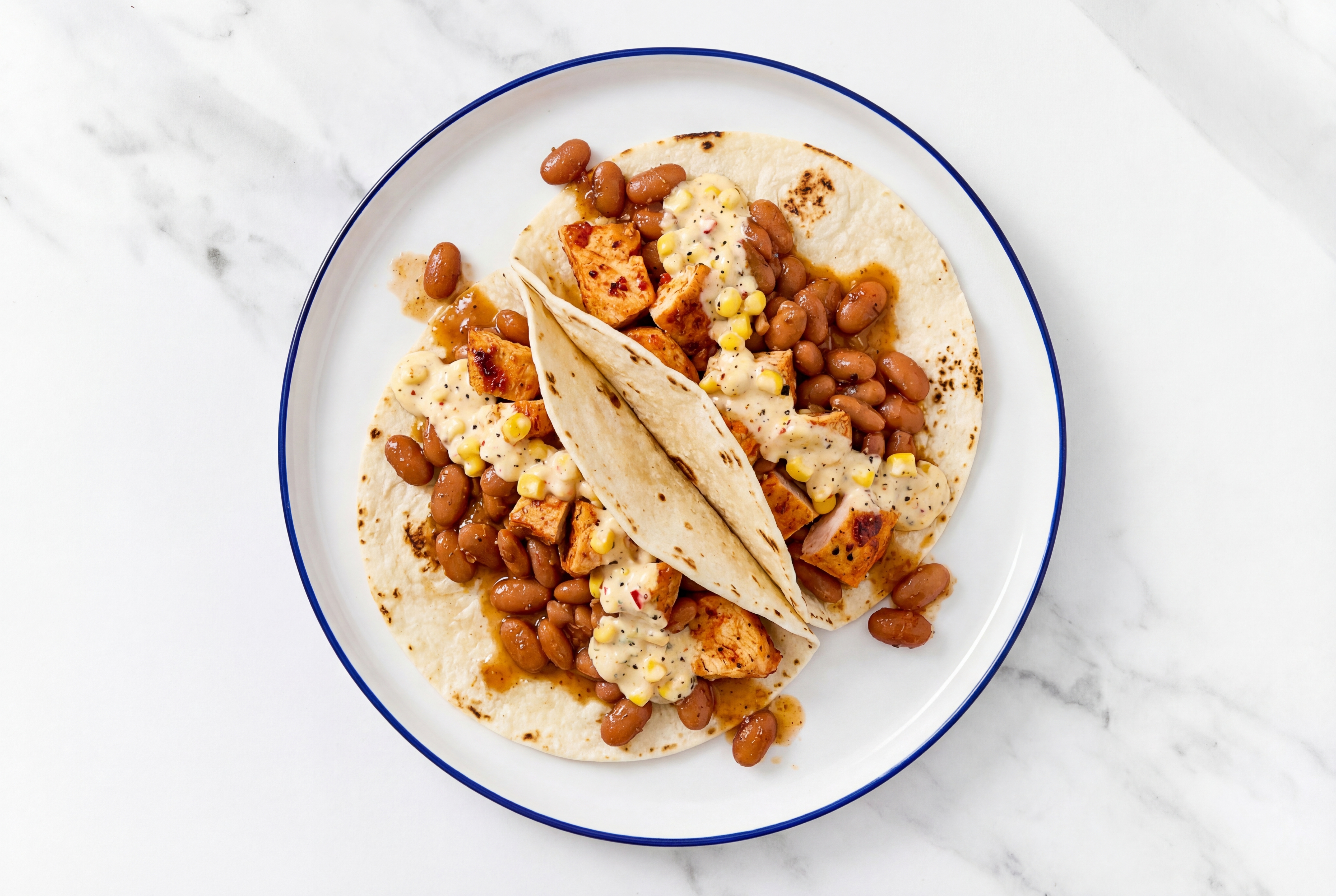  Chipotle Chicken Tacos with Street Corn Sauce & Pinto Beans