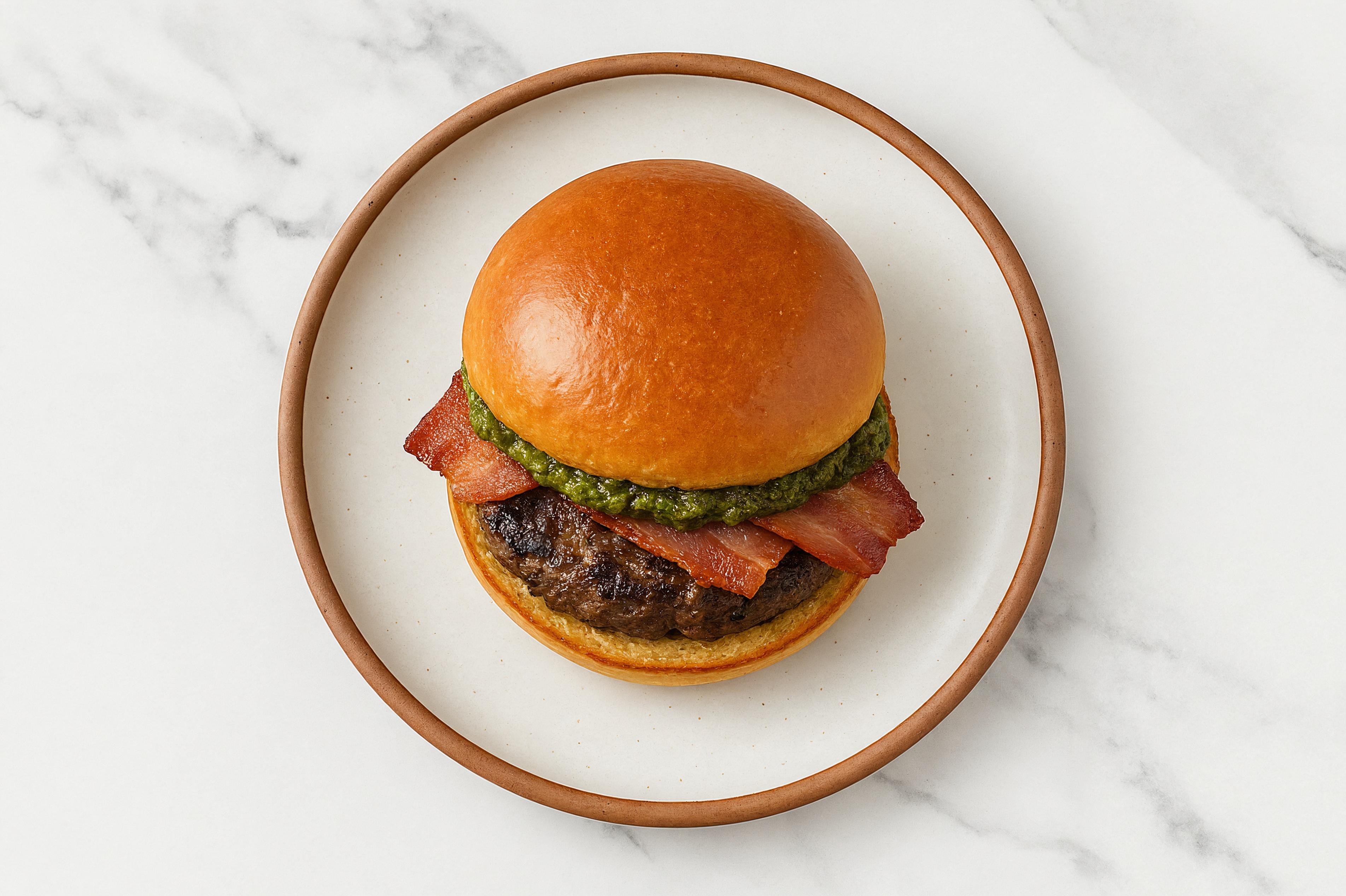 Bison Burger on Brioche with Spinach Pesto & Turkey Bacon