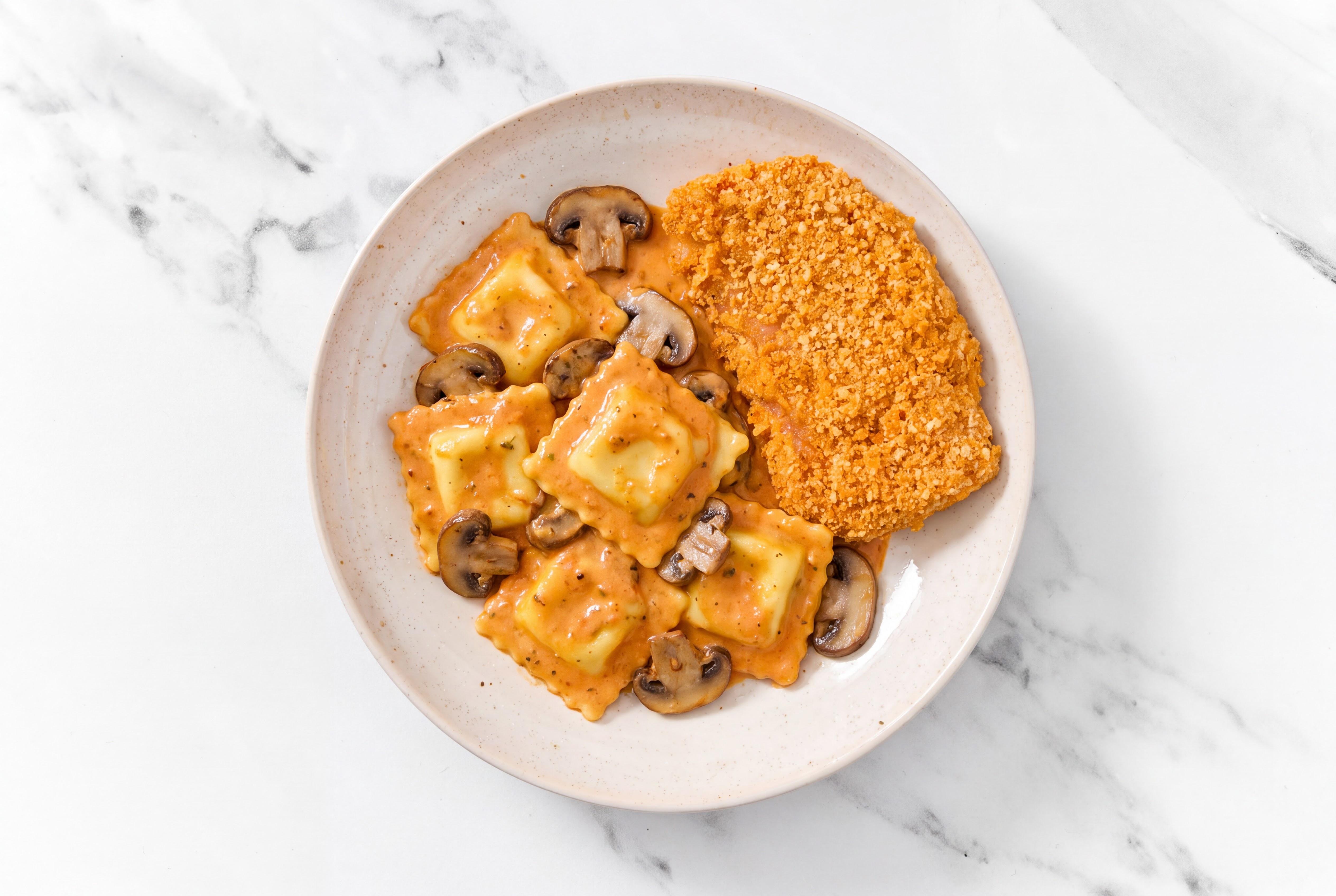 Crispy Hot Honey Chicken over Creamy Vodka Ravioli with Baby Bella Mushrooms