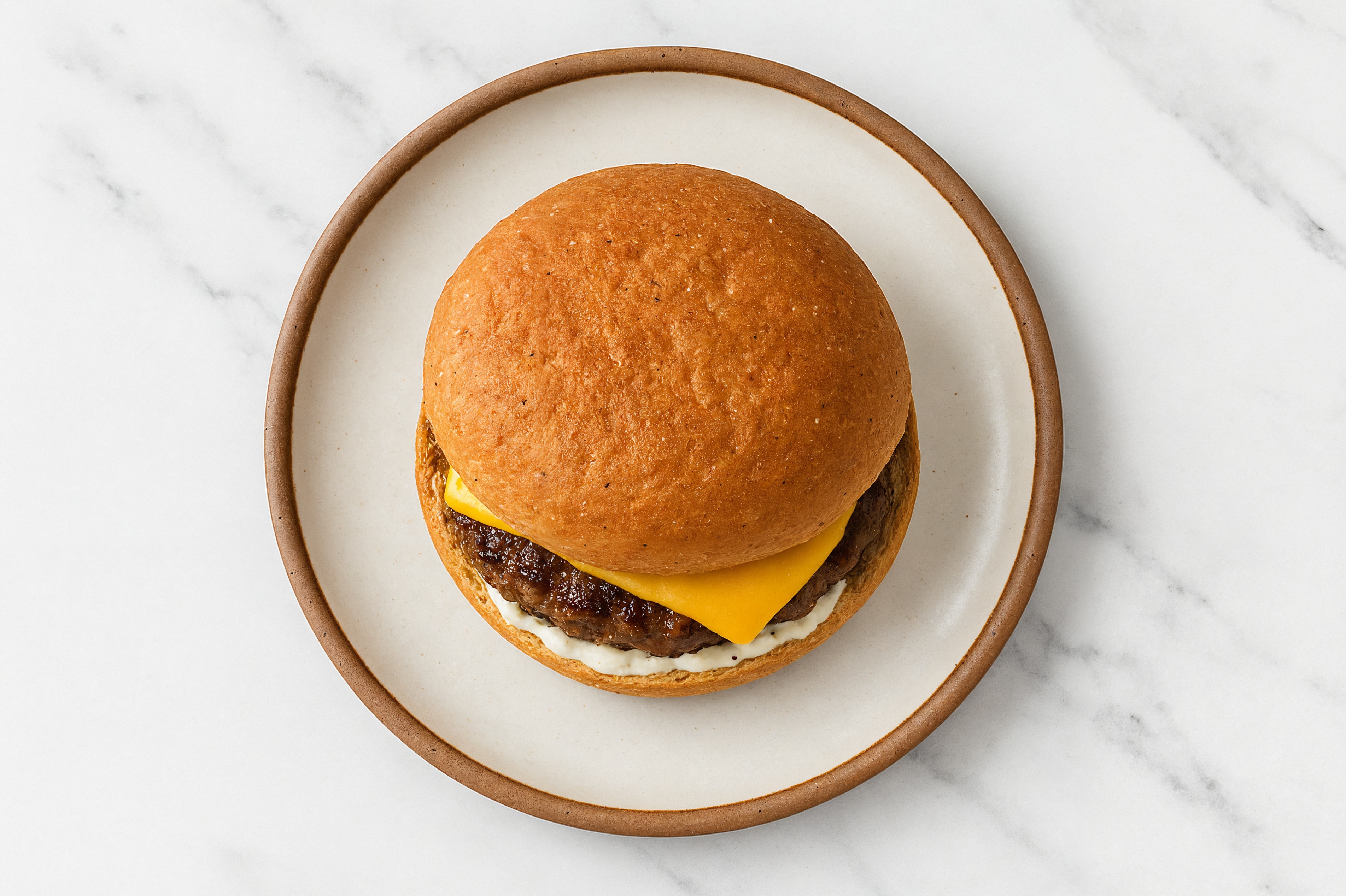Ground Lamb Burger on Sprouted Grain with Tzatziki & Cheddar