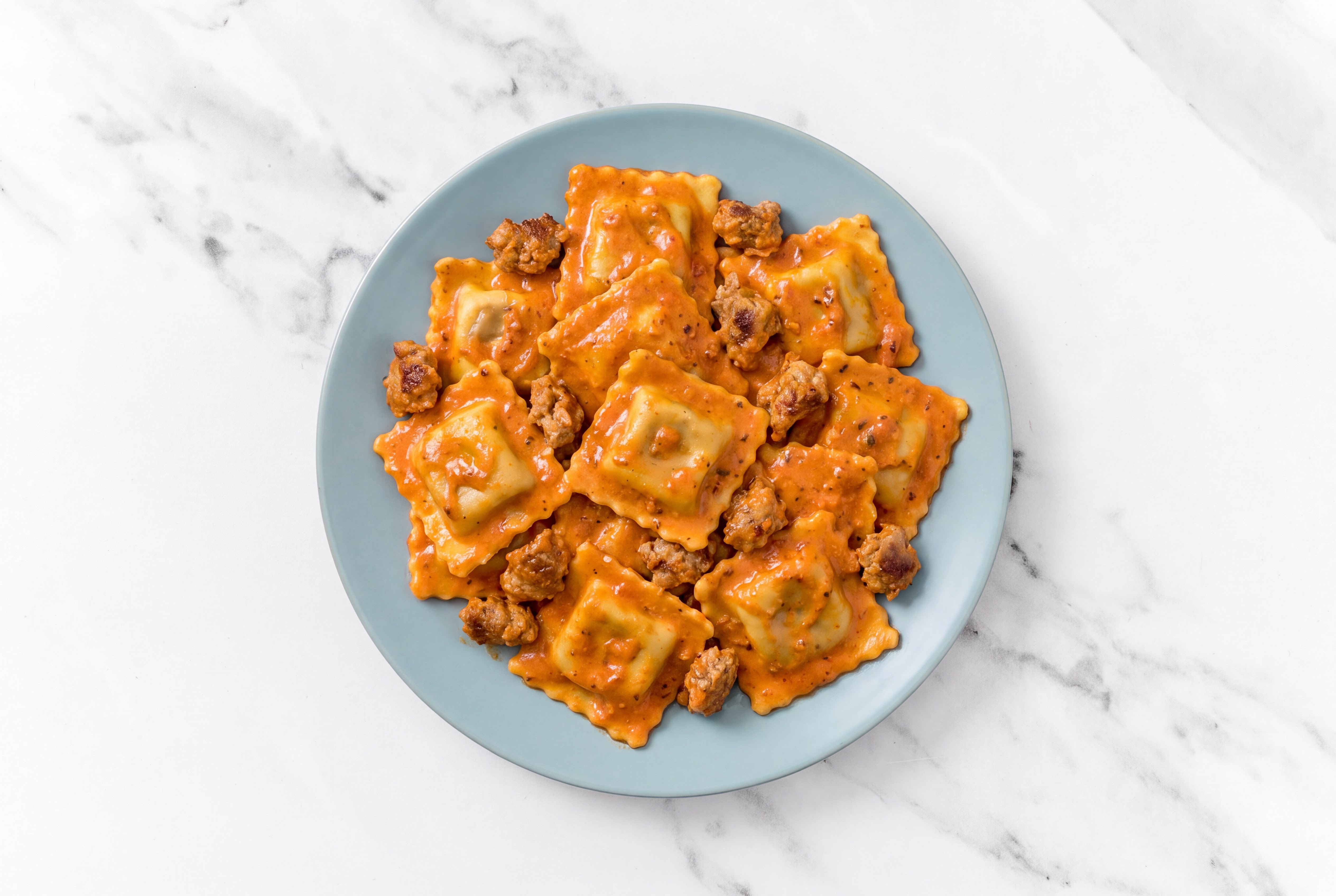 Bolognese Ravioli + Spicy Sausage Marinara