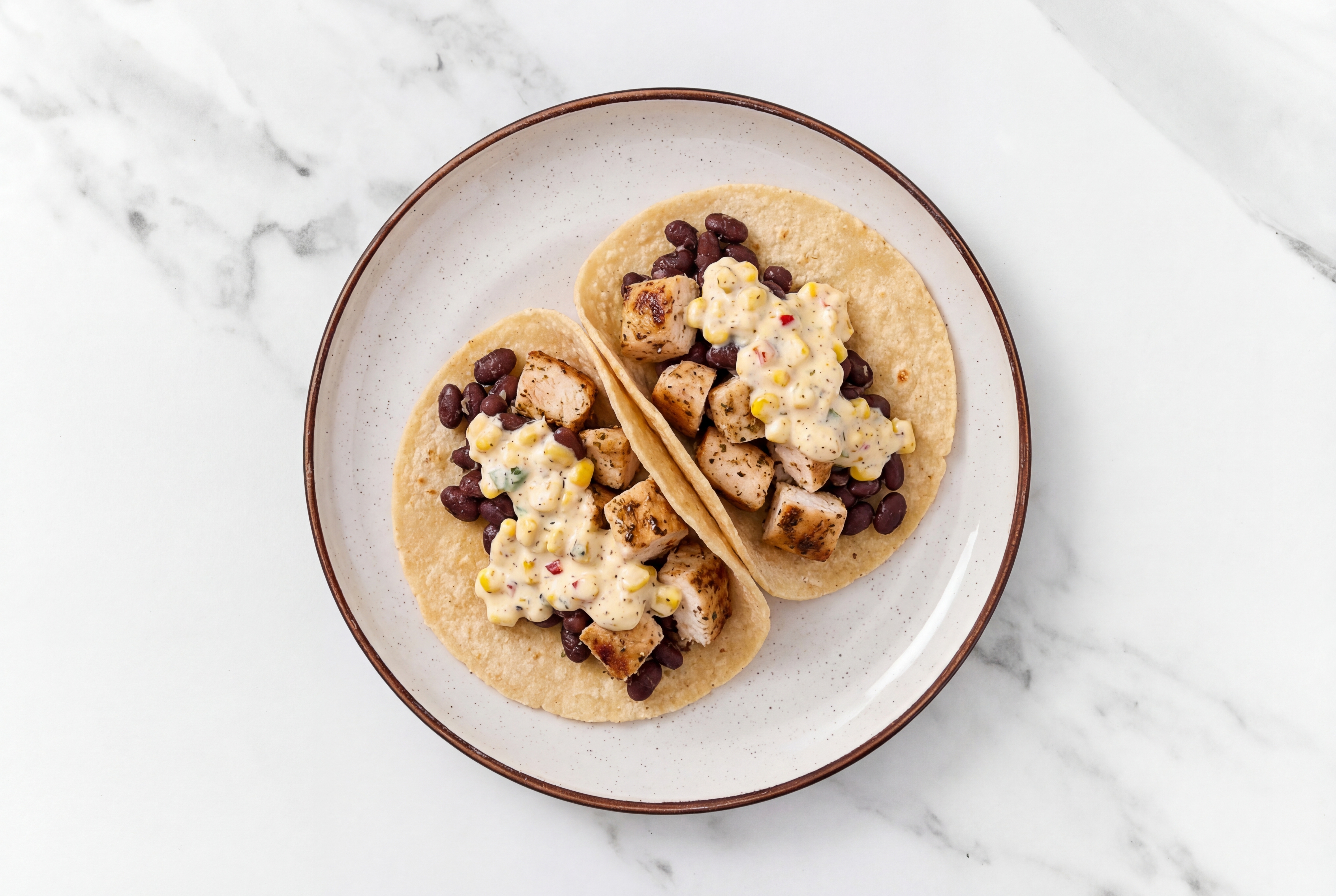 Garlic Chicken Tacos with Street Corn Sauce & Spiced Beans