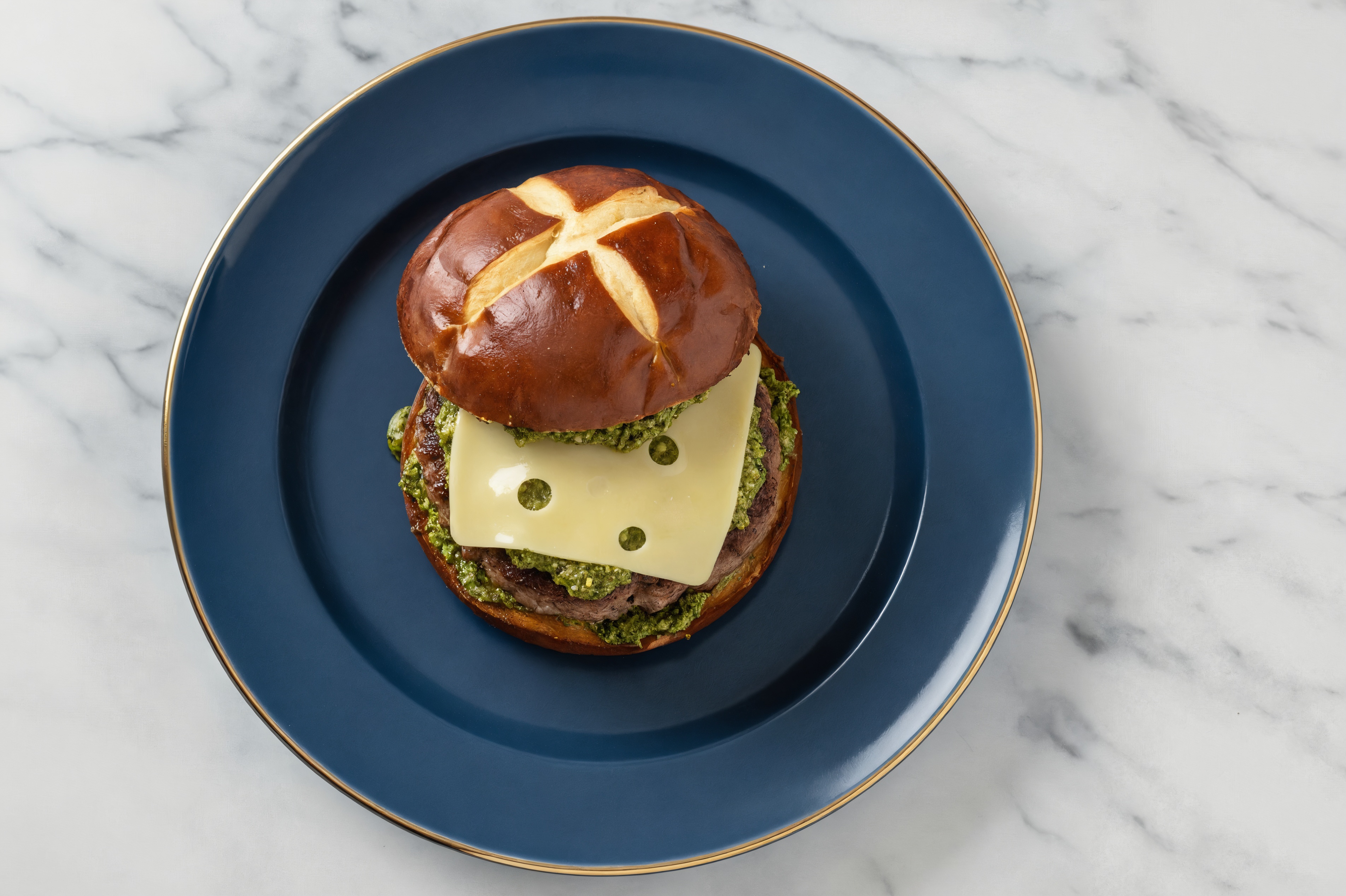 Lamb Burger on Pretzel with Spinach Pesto & Swiss