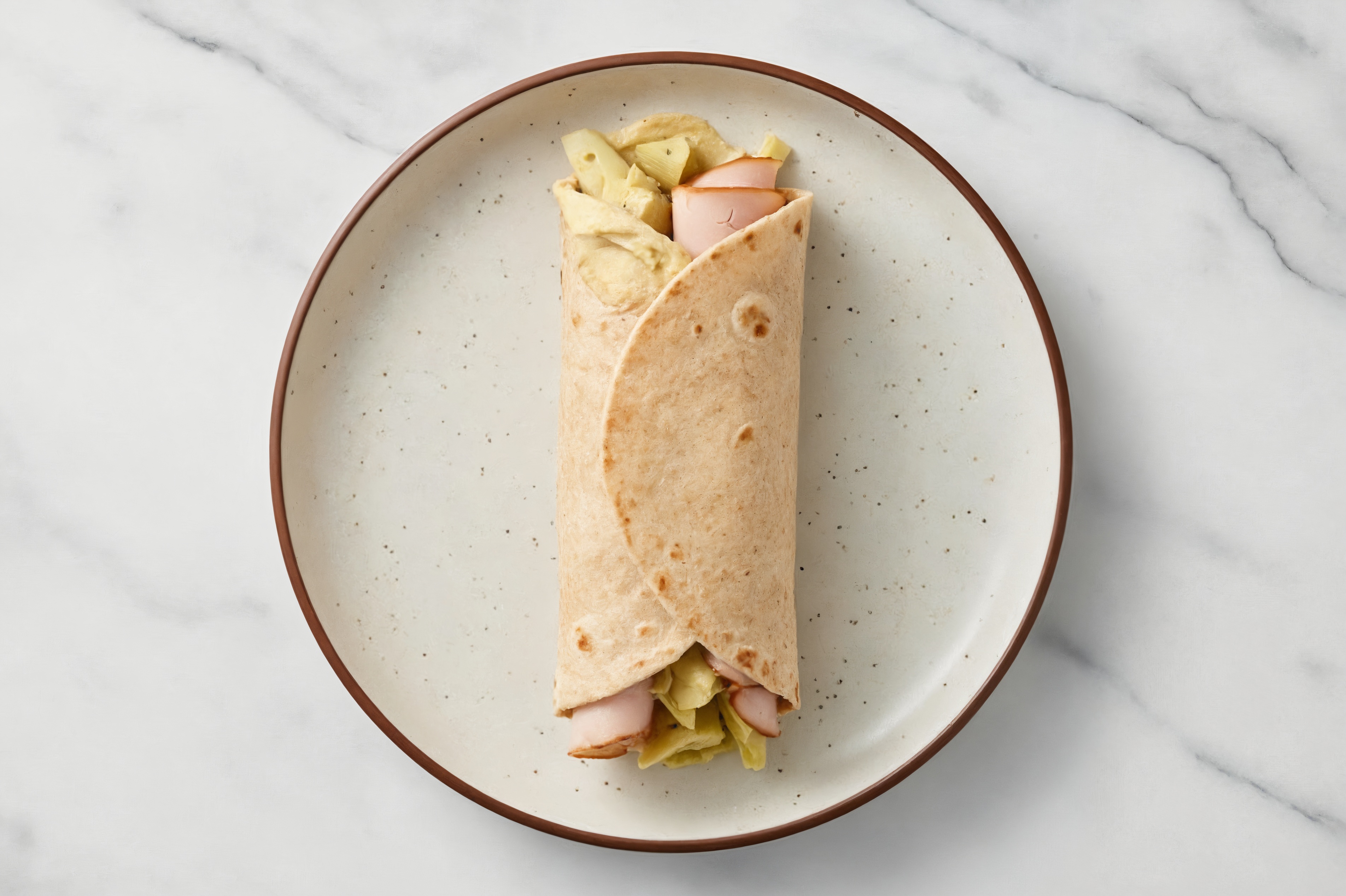 Zesty Mediterranean-Inspired Oven Roasted Turkey Breast + Lemon Garlic Hummus Wrap