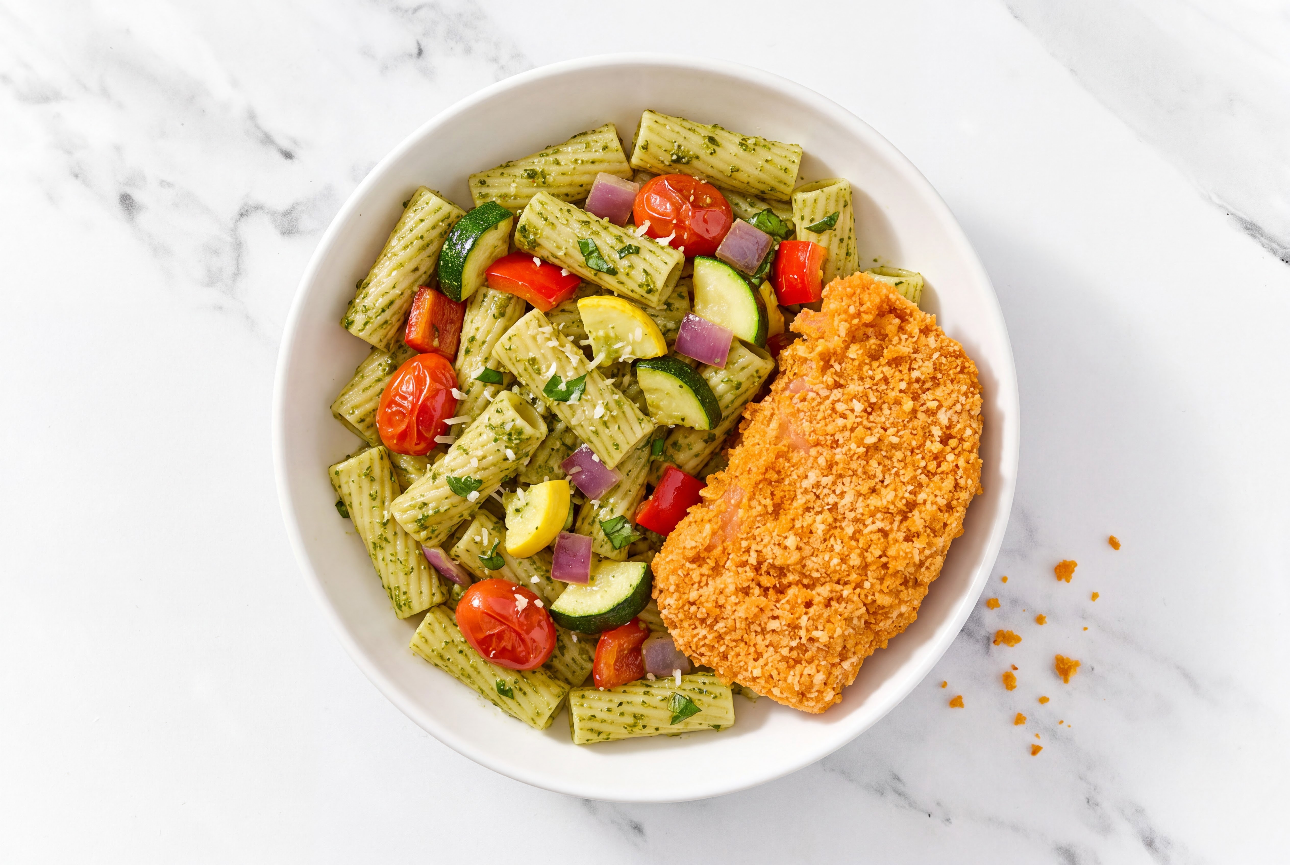 Crispy Hot Honey Chicken over Pesto Rigatoni with Mixed Veggies