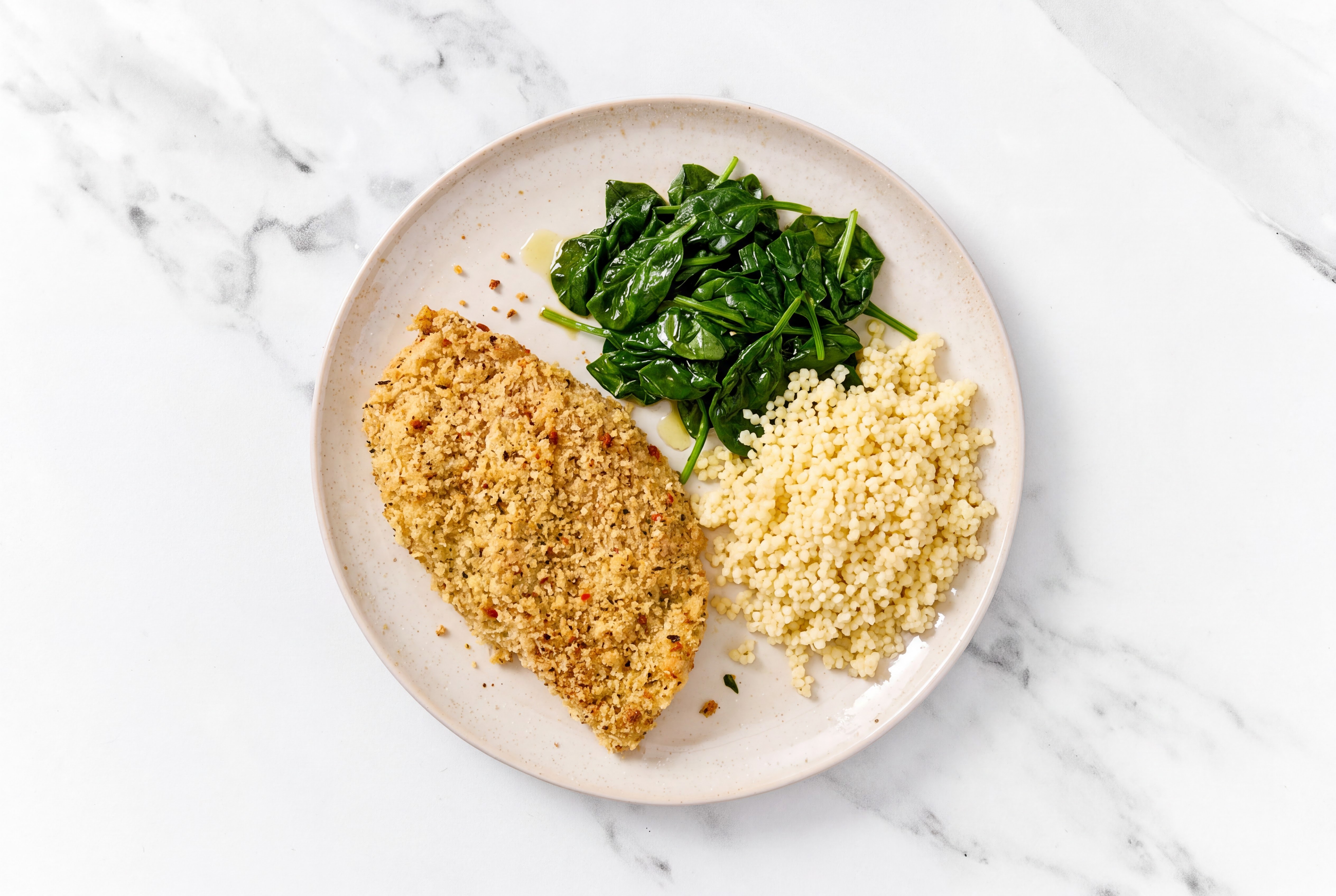 Parmesan Breaded Chicken Cutlet with Baby Spinach & Couscous