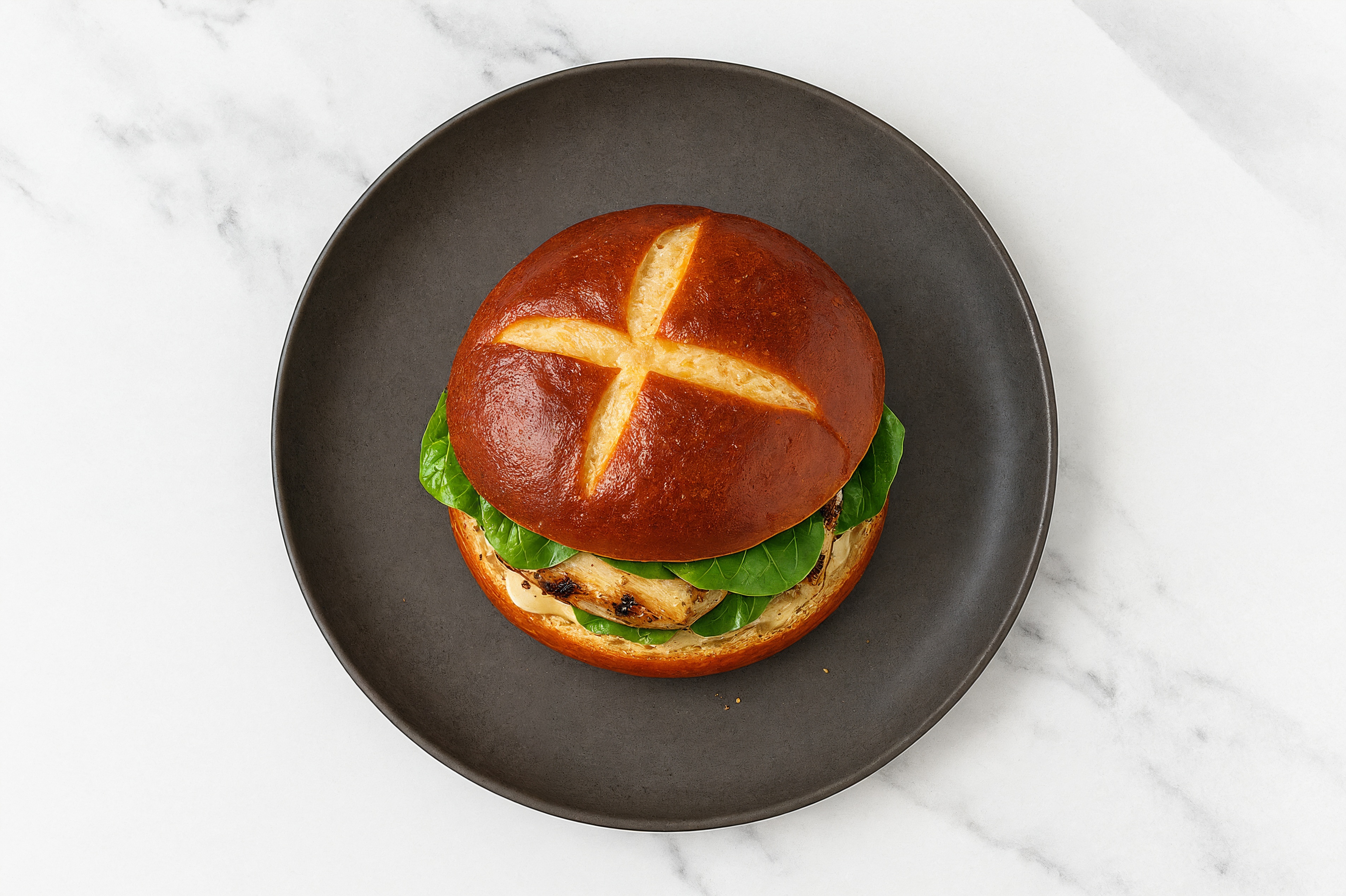 Pretzel Caesar Mediterranean Chicken Sandwich