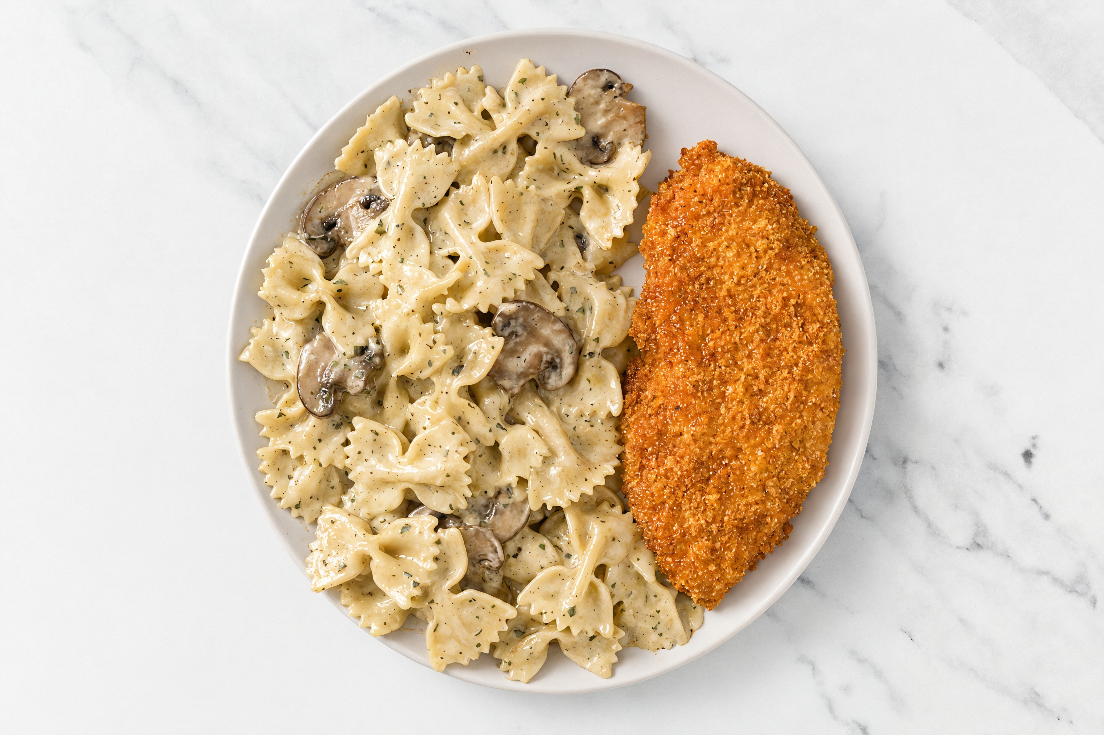 Crispy Hot Honey Chicken over Creamy Farfalle with Baby Bella Mushrooms