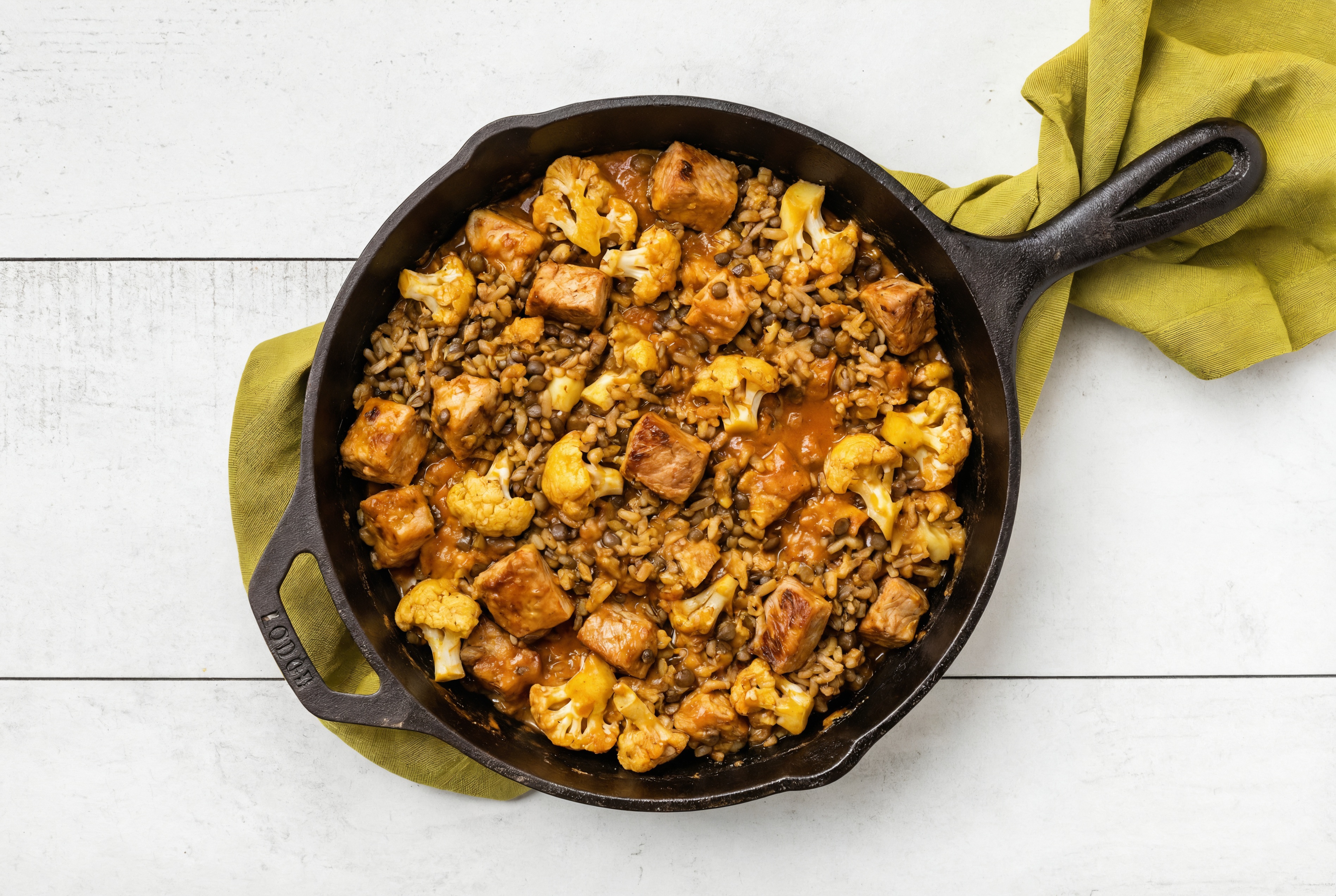 Tikka Masala Pork Chop Stir-Fry with Cauliflower over Quinoa